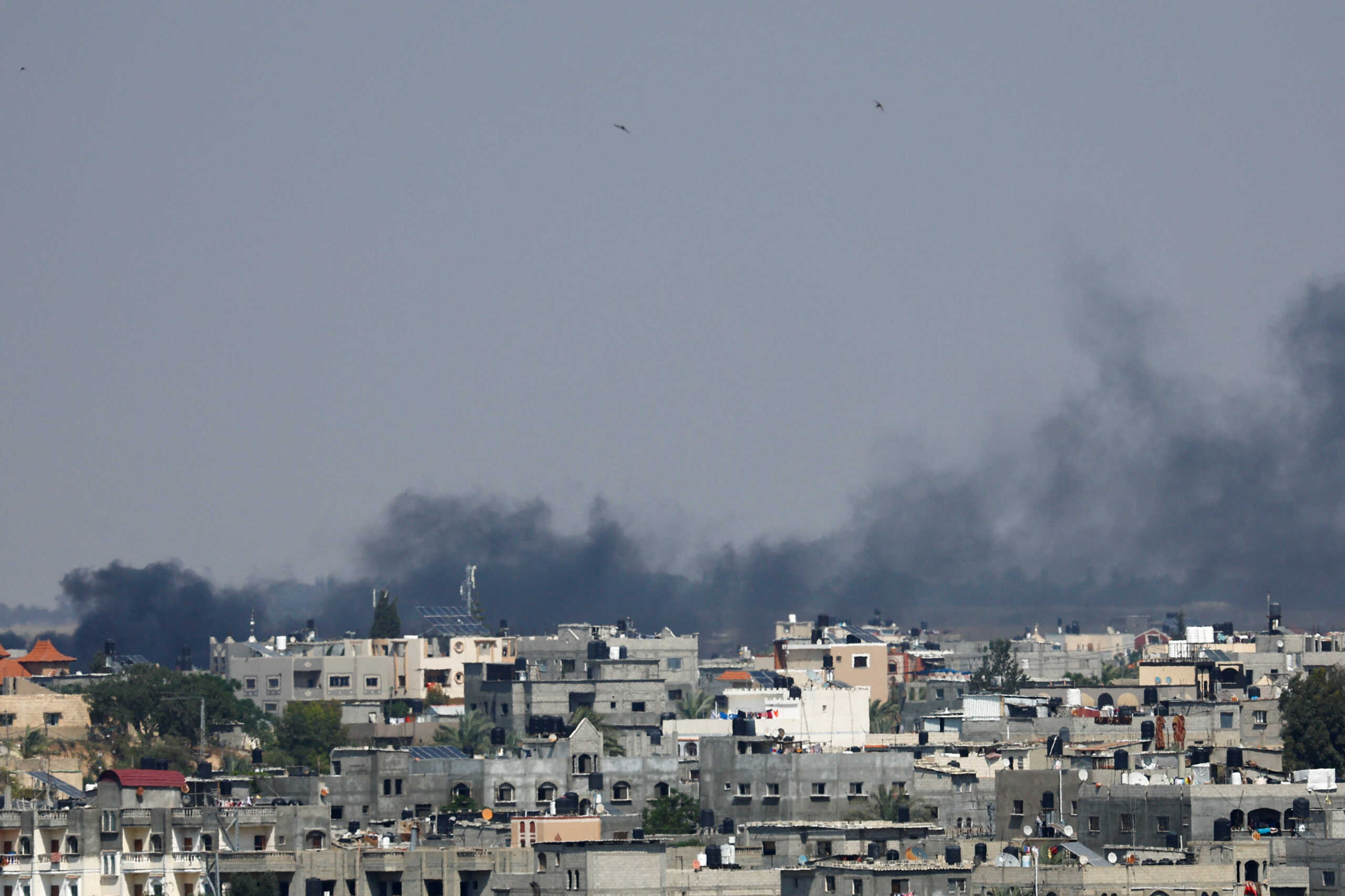 Smoke rises following an Israeli strike, in Khan Younis in the southern Gaza Strip May 9, 2023. REUTERS