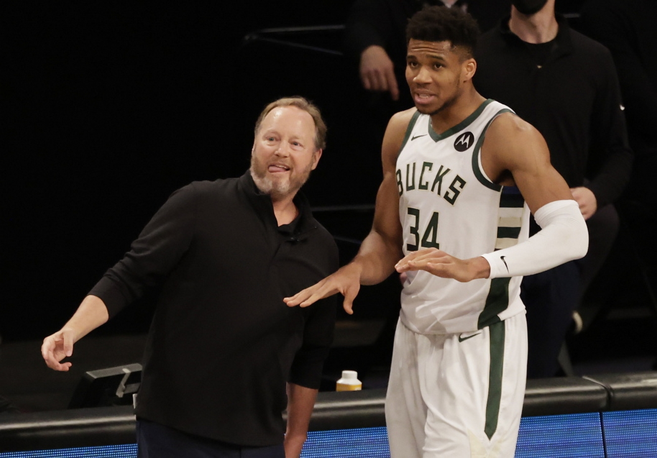 epa09275176 Milwaukee Bucks head coach Mike Budenholzer (L) and Milwaukee Bucks forward Giannis Antetokounmpo (R) of Greece react during game five of the 2021 NBA Eastern Conference Semi-Finals basketball playoff series between the Milwaukee Bucks and the Brooklyn Nets at the Barclays Center in Brooklyn, New York, USA, 15 June 2021.  EPA