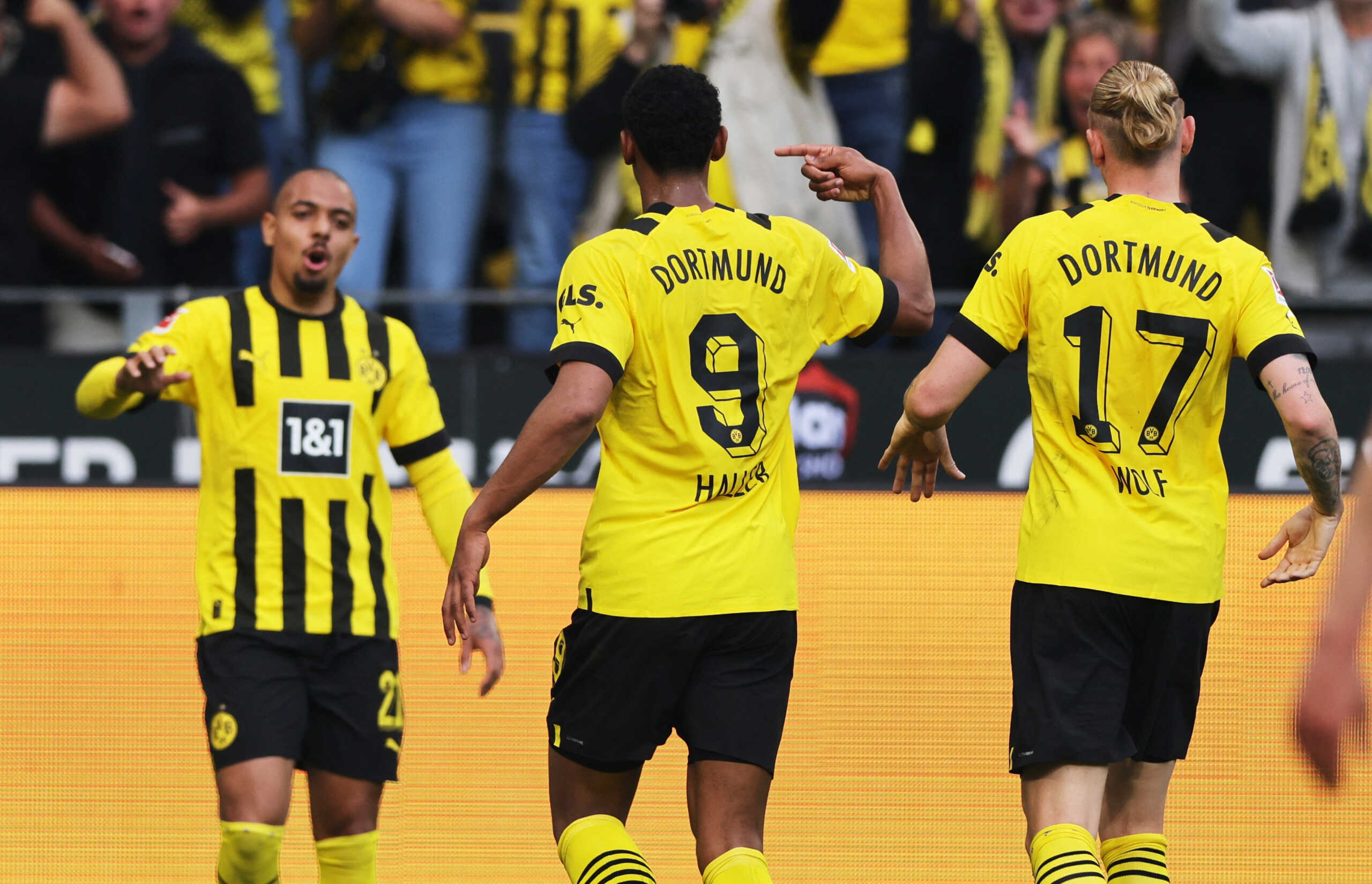 Soccer Football - Bundesliga - Borussia Dortmund v Borussia Moenchengladbach - Signal Iduna Park, Dortmund, Germany - May 13, 2023 Borussia Dortmund's Sebastien Haller celebrates scoring their fourth goal with Donyell Malen and Marius Wolf REUTERS