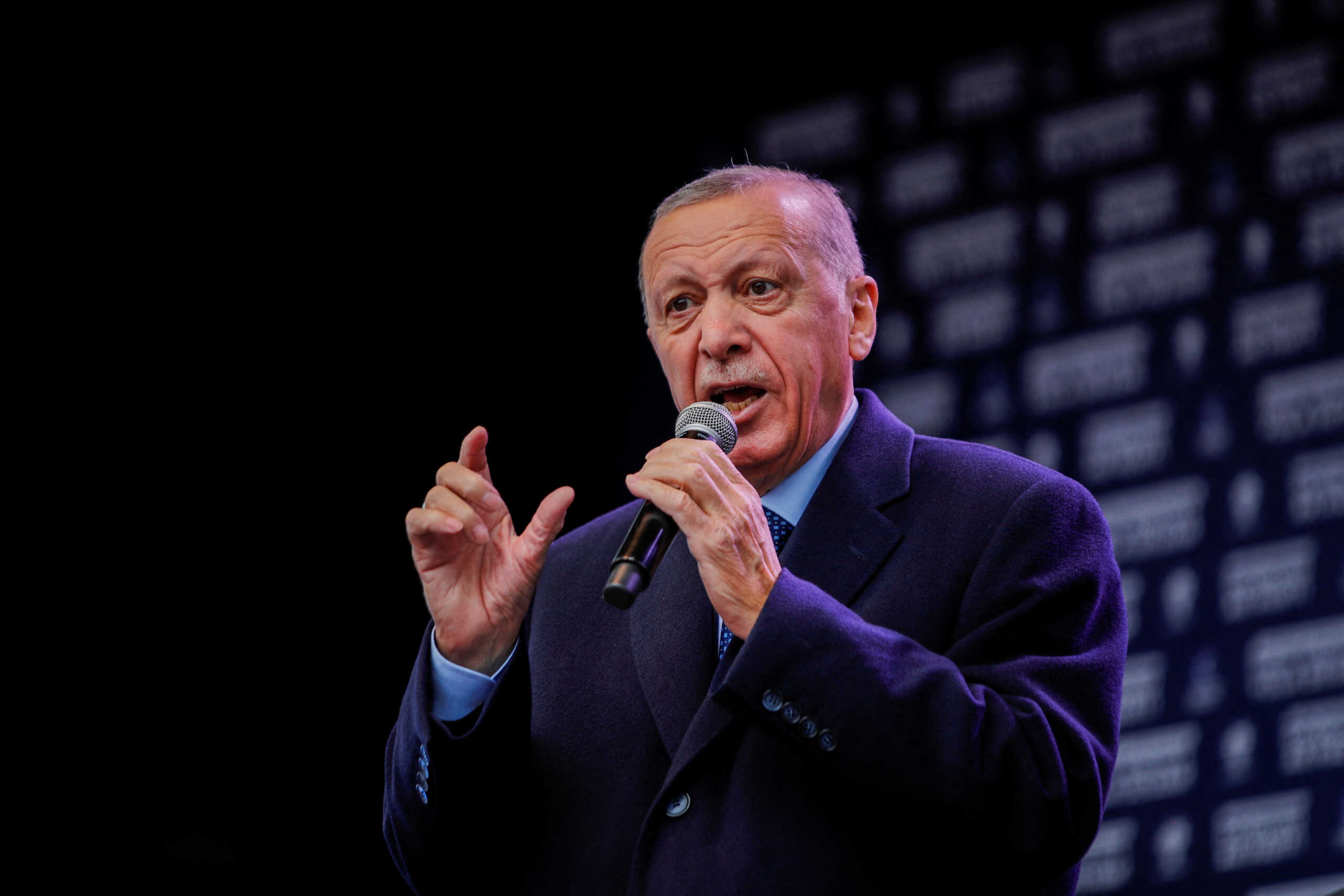 Turkish President Tayyip Erdogan addresses his supporters during a rally ahead of the May 14 presidential and parliamentary elections, in Istanbul, Turkey May 12, 2023. REUTERS