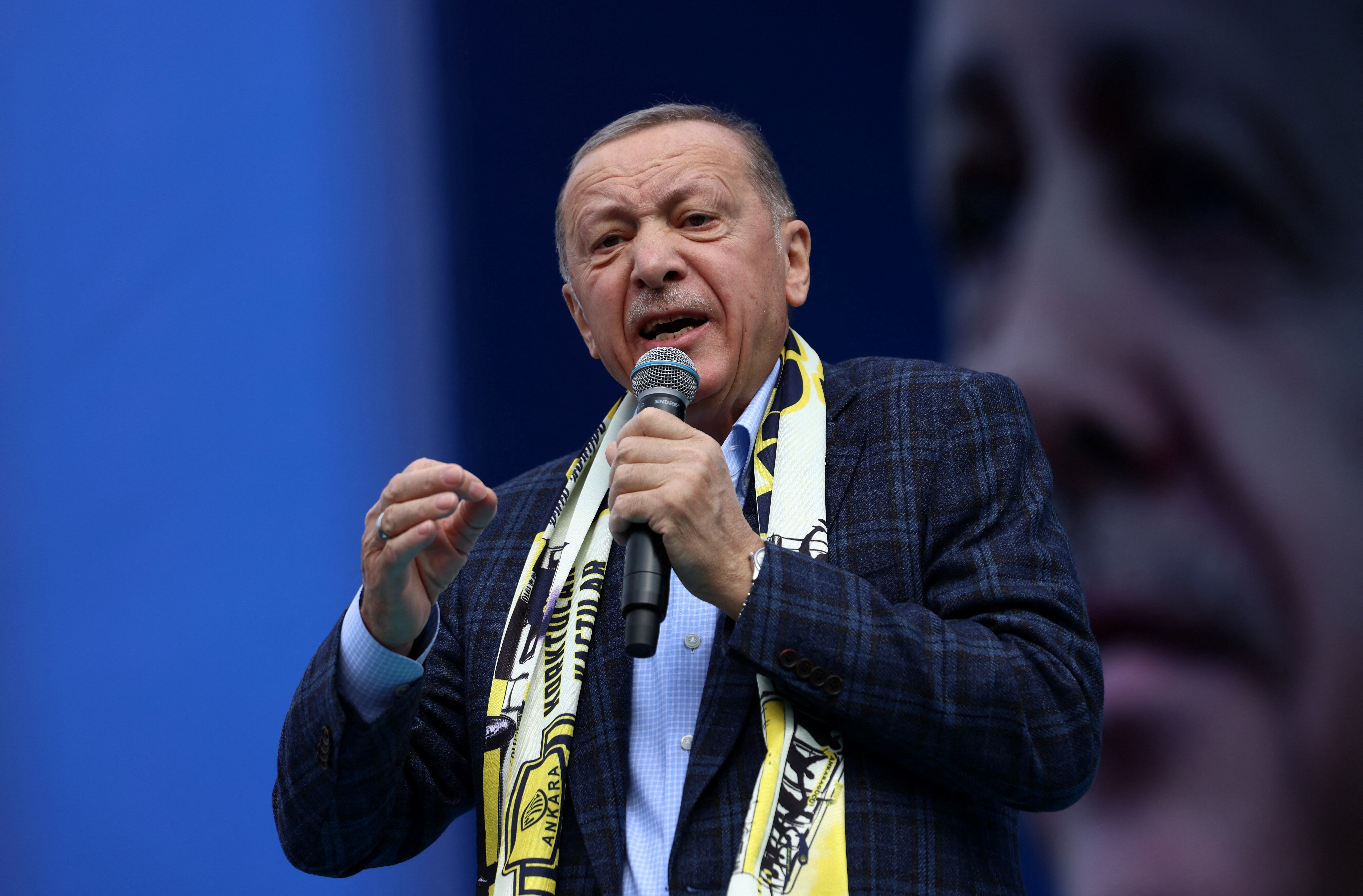 Turkish President Tayyip Erdogan addresses his supporters during a rally ahead of the May 14 presidential and parliamentary elections, in Ankara, Turkey April 30, 2023. REUTERS