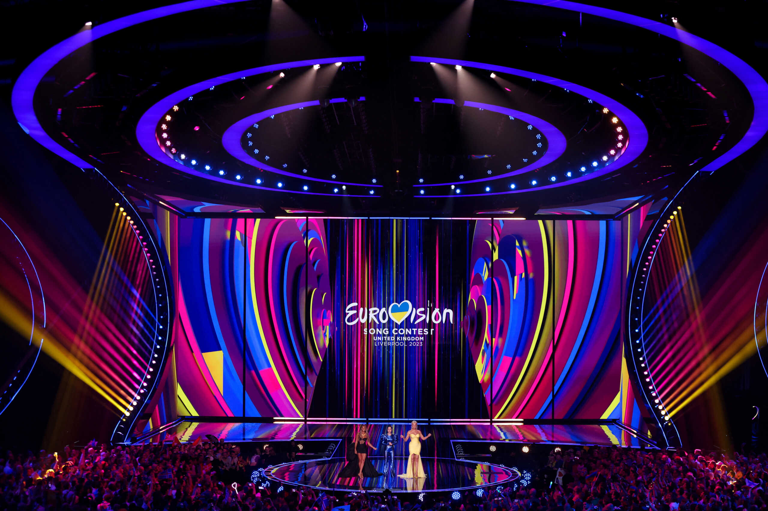 Hosts Julia Sanina, Hannah Waddingham and Alesha Dixon stand on stage during the second semi-final of the 2023 Eurovision Song Contest in Liverpool, Britain, May 11, 2023. REUTERS