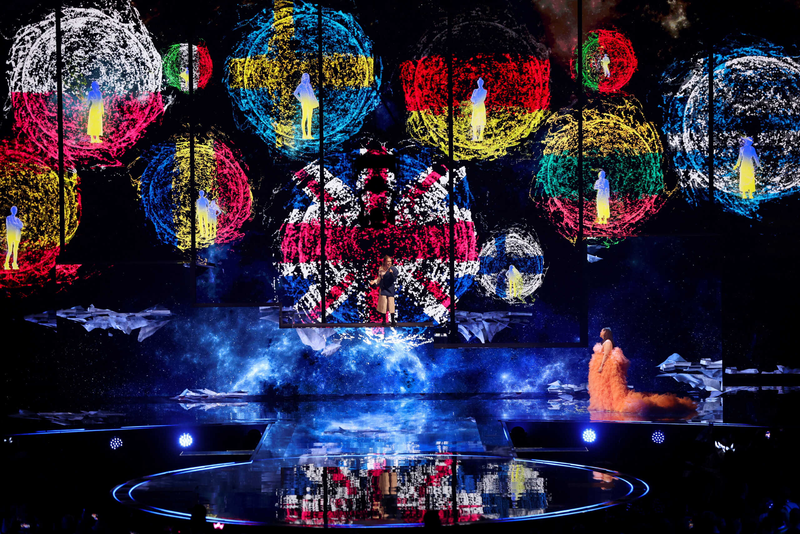 Alyosha and Rebecca Ferguson perform during the first semi-final of the 2023 Eurovision Song Contest in Liverpool, Britain, May 9, 2023. REUTERS