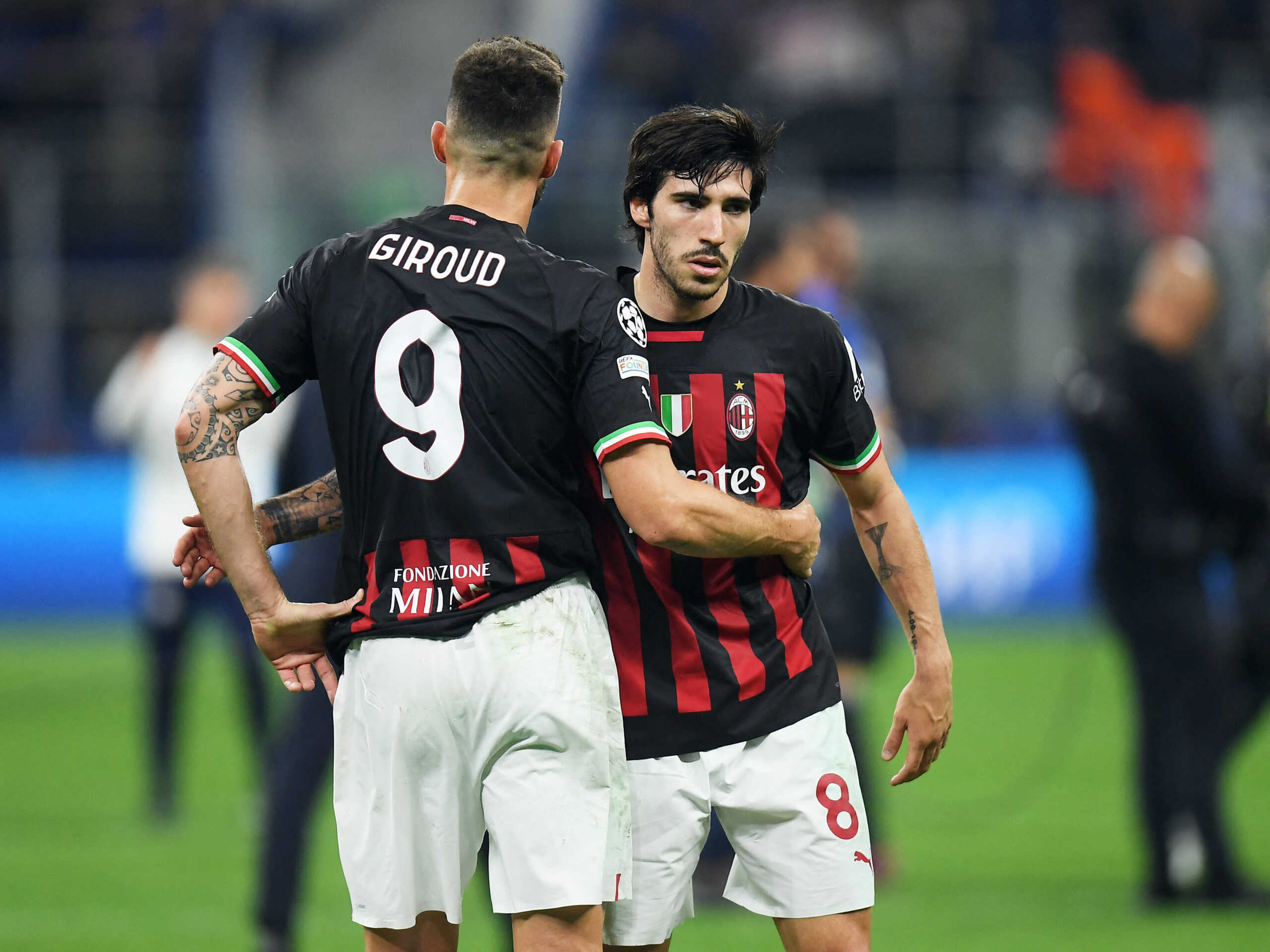 Soccer Football - Champions League - Semi Final - Second Leg - Inter Milan v AC Milan - San Siro, Milan, Italy - May 16, 2023 AC Milan's Sandro Tonali and Olivier Giroud look dejected after the match REUTERS