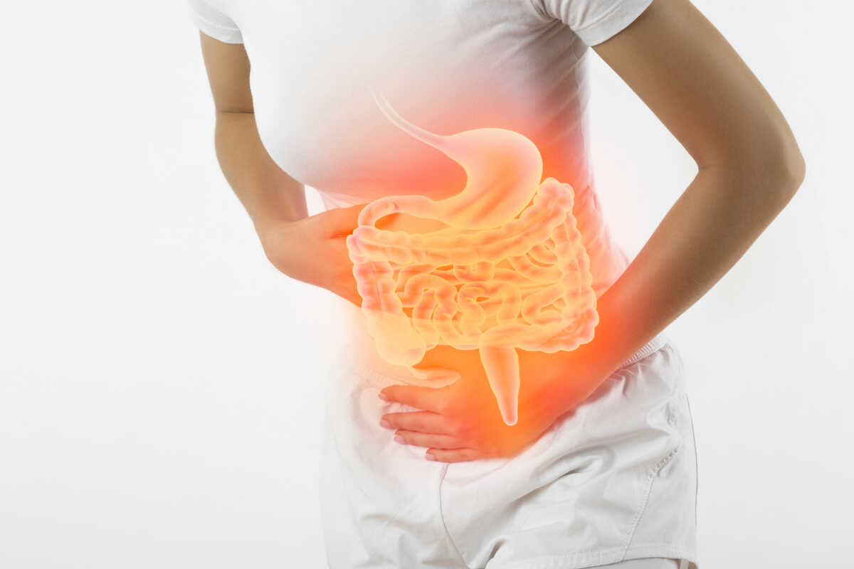 Woman touching stomach