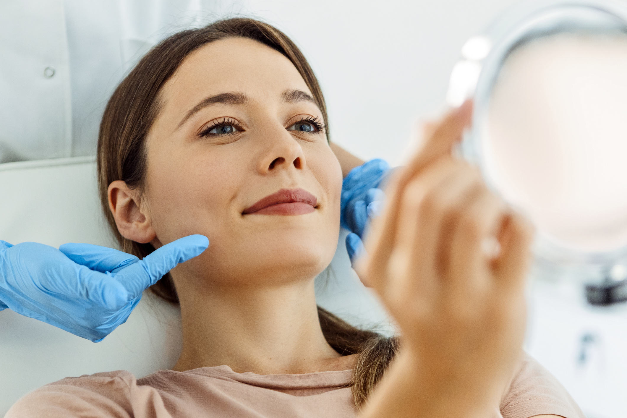 Young Beautiful Woman Having Various Facial Treatment