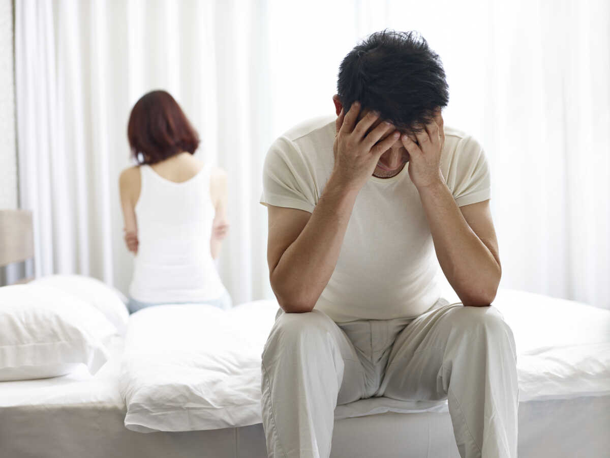 young asian couple with relationship problem appear depressed and frustrated.