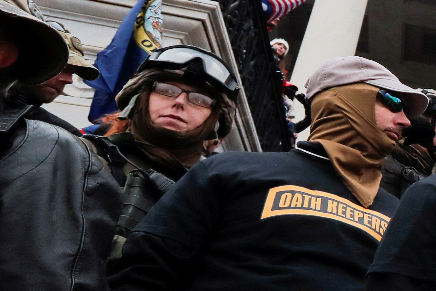 FILE PHOTO: Members of the Oath Keepers militia group, including Jessica Marie Watkins (Left), stand among supporters of U.S. President Donald Trump protesting against the certification of the 2020 U.S. presidential election results by the U.S. Congress, on the east front steps of the U.S. Capitol in Washington, U.S., January 6, 2021. Picture taken January 6, 2021. REUTERS