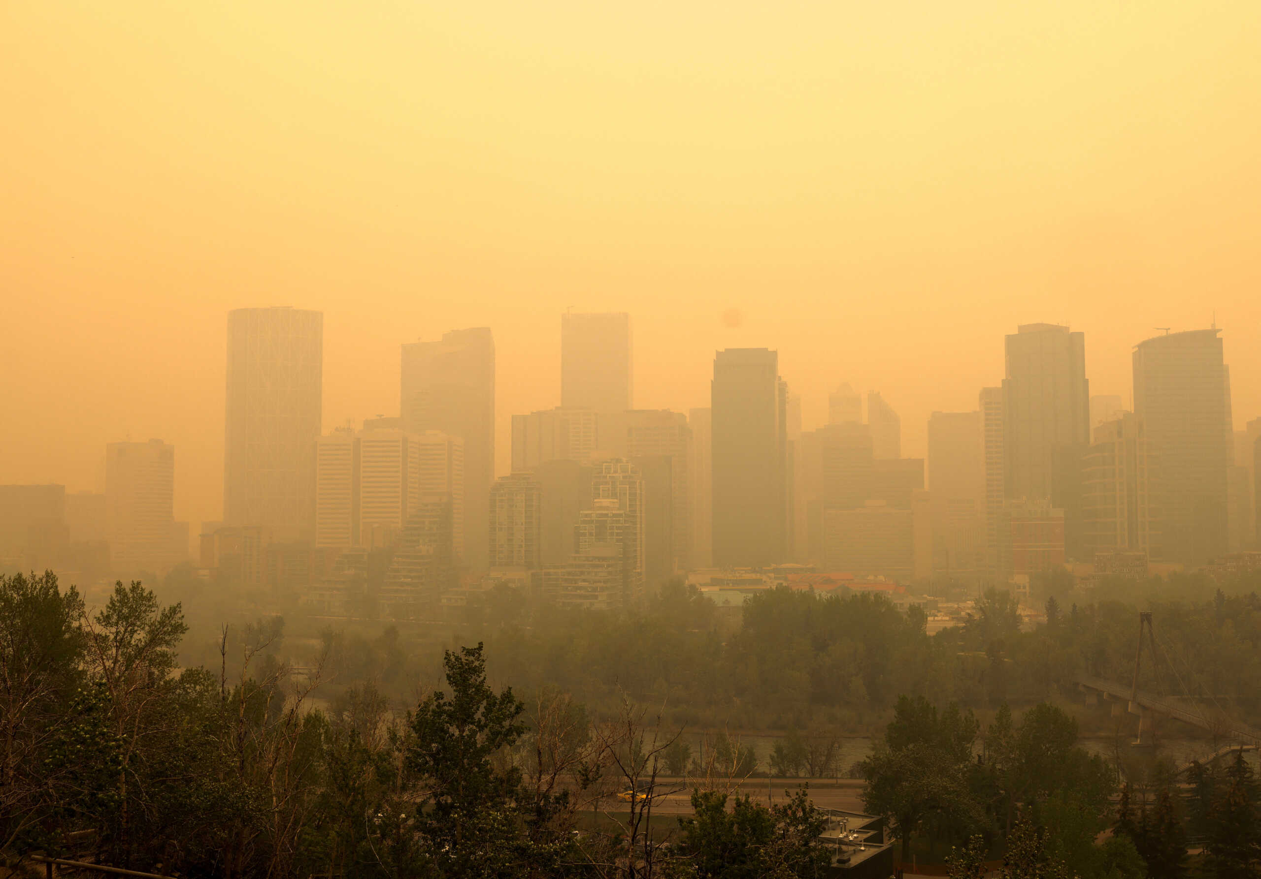 Smoke is seen as some 90 wildfires are active in Alberta, with 23 out of control, according to the provincial government, in Calgary, Alberta, Canada May 16, 2023.  REUTERS