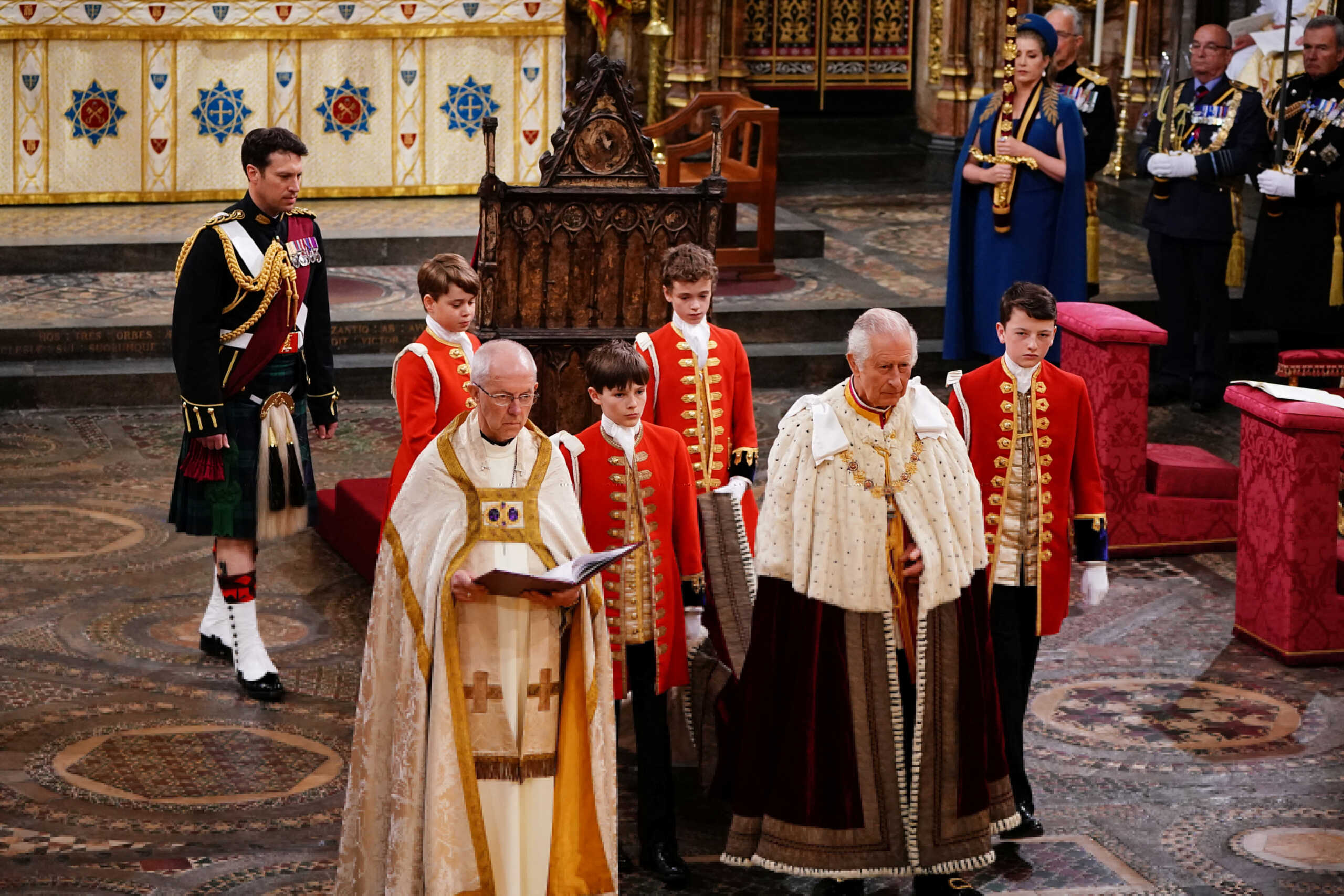 Prince George (left) with King Charles III during his coronation ceremony in Westminster Abbey, London. Saturday May 6, 2023. Yui Mok