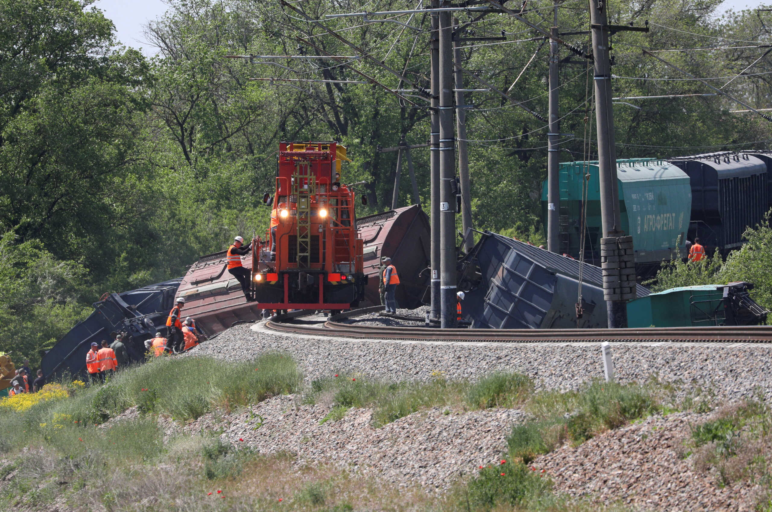 A view shows derailed wagons following an accident involving a freight train carrying grain in the Simferopol District, Crimea, May 18, 2023. REUTERS