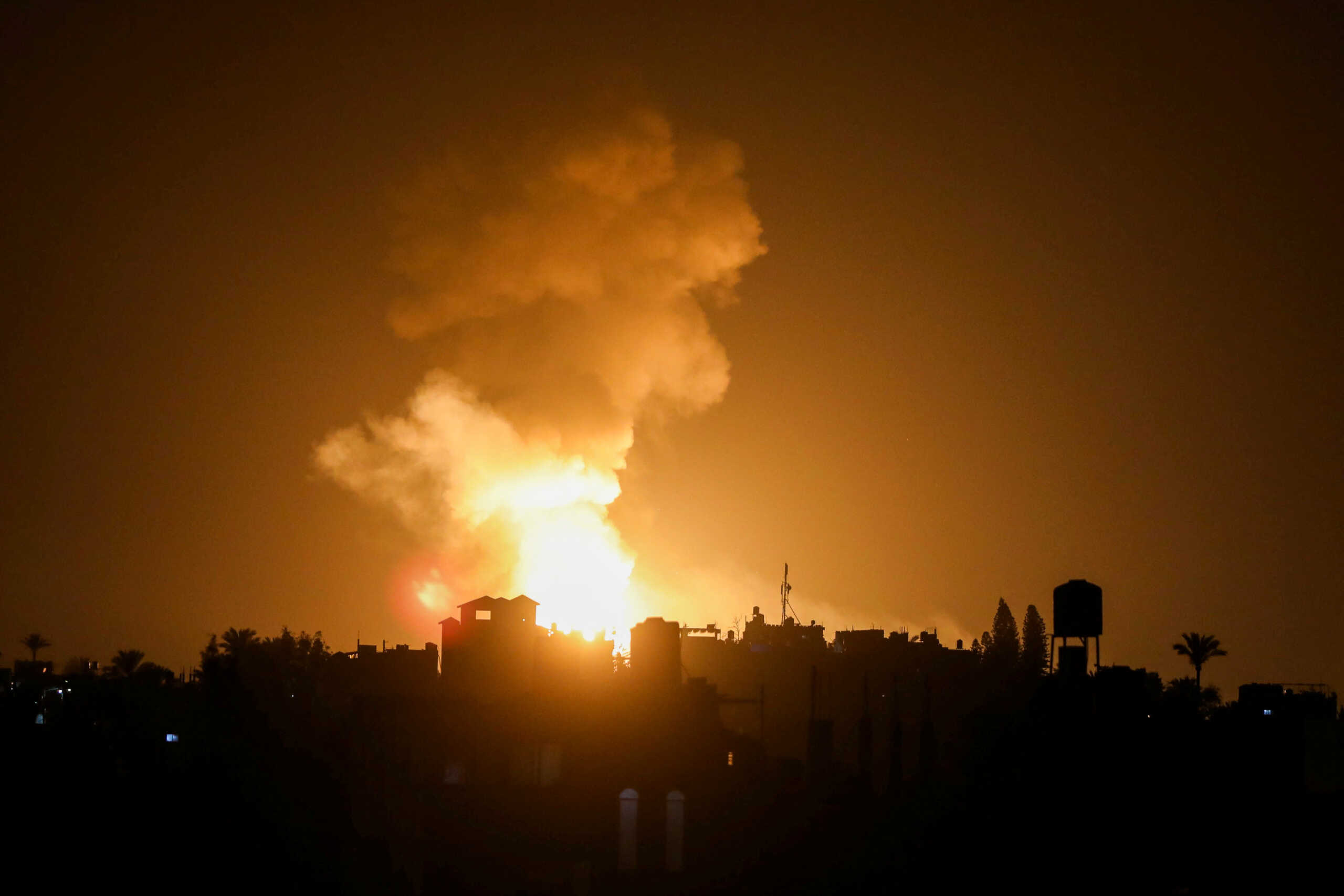 An explosion is seen following Israeli airstrikes in the southern Gaza strip May 9, 2023. Reuters