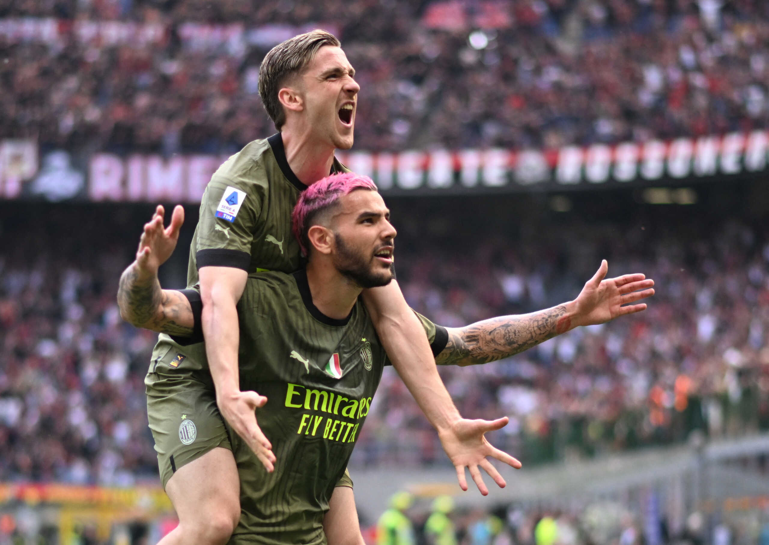 Soccer Football - Serie A - AC Milan v Lazio - San Siro, Milan, Italy - May 6, 2023 AC Milan's Theo Hernandez celebrates scoring their second goal with Alexis Saelemaekers REUTERS
