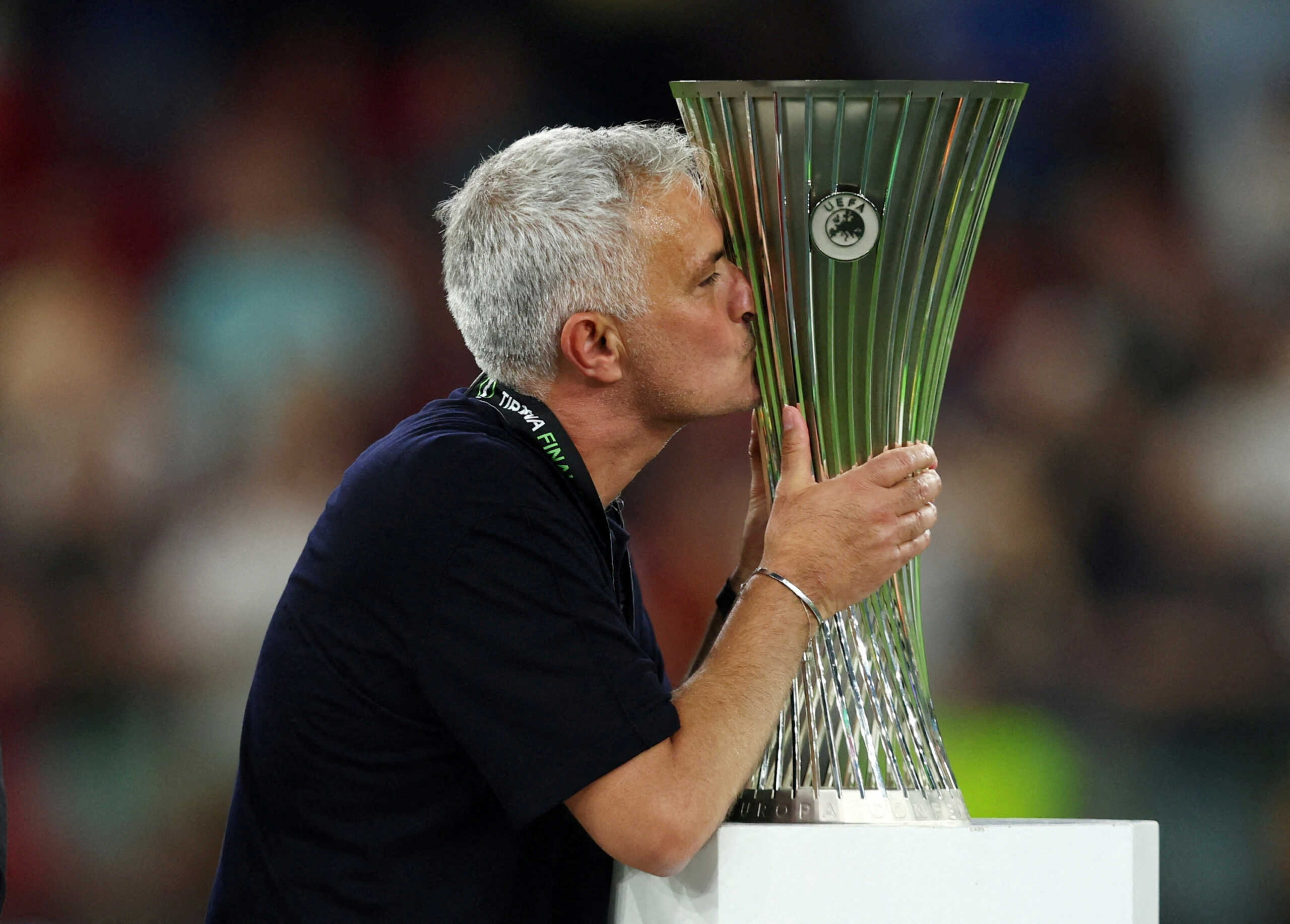 FILE PHOTO: Soccer Football - Europa Conference League - Final - AS Roma v Feyenoord - Arena Kombetare, Tirana, Albania - May 25, 2022  AS Roma coach Jose Mourinho celebrates with the trophy after winning the Europa Conference League REUTERS