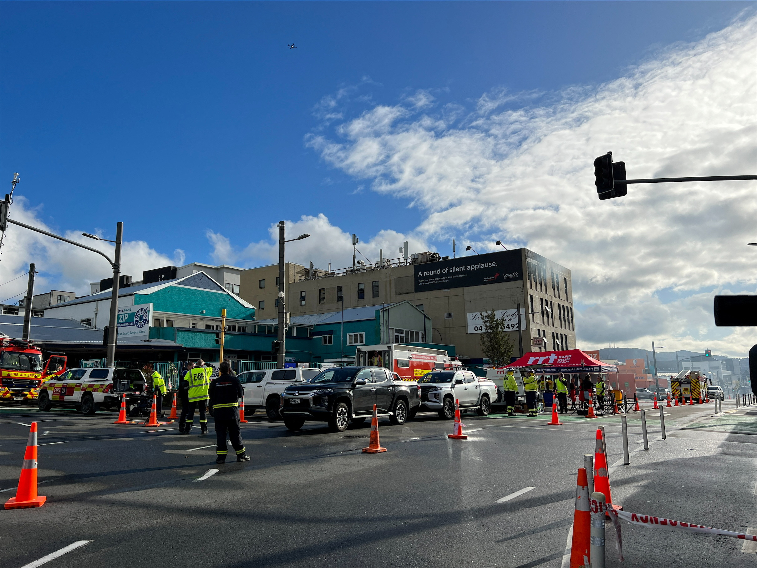 Fire and emergency crews work at the scene of a fire at the Loafers Lodge, in Wellington, New Zealand May 16, 2023. REUTERS