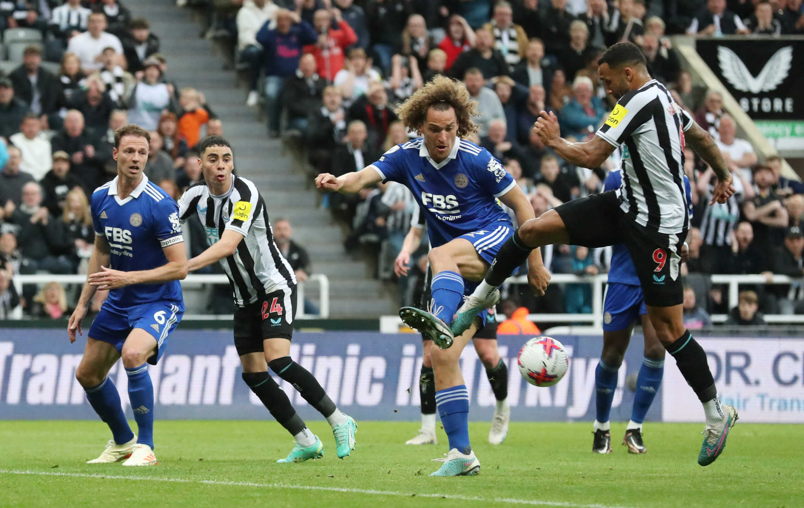 Soccer Football - Premier League - Newcastle United v Leicester City - St James' Park, Newcastle, Britain - May 22, 2023  Leicester City's Wout Faes in action with Newcastle United's Callum Wilson REUTERS