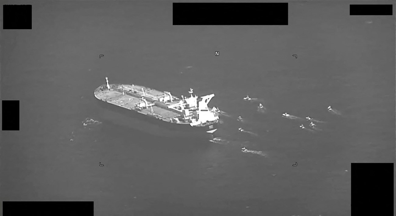 Fast-attack crafts from Iran's Islamic Revolutionary Guard Corps Navy swarming Panama-flagged oil tanker Niovi as it transits the Strait of Hormuz from Dubai to port of Fujairah in the United Arab Emirates, Arabian Gulf early hours of May 3, 2023, are seen in this screenshot of a video shot provided by U.S. Navy on May 3, 2023. U.S. Naval Forces Central Command