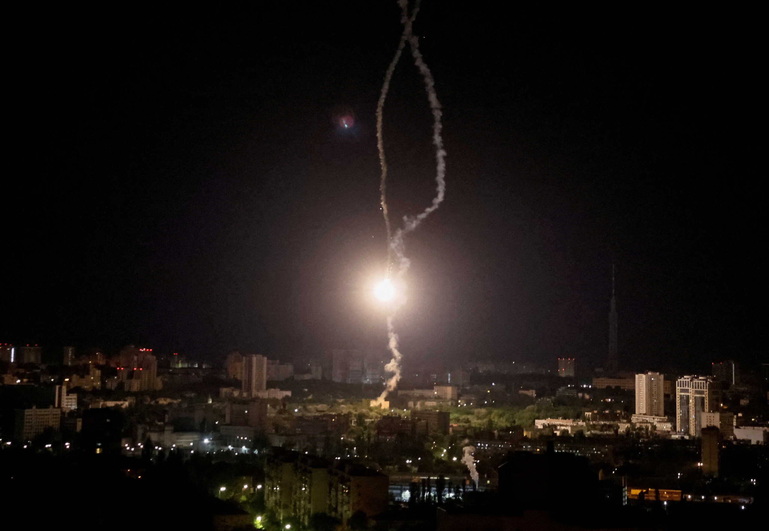 FILE PHOTO: Explosion of a missile is seen in the sky over the Kyiv during a Russian missile strike, amid Russia's attack on Ukraine, in Kyiv, Ukraine May 16, 2023. REUTERS