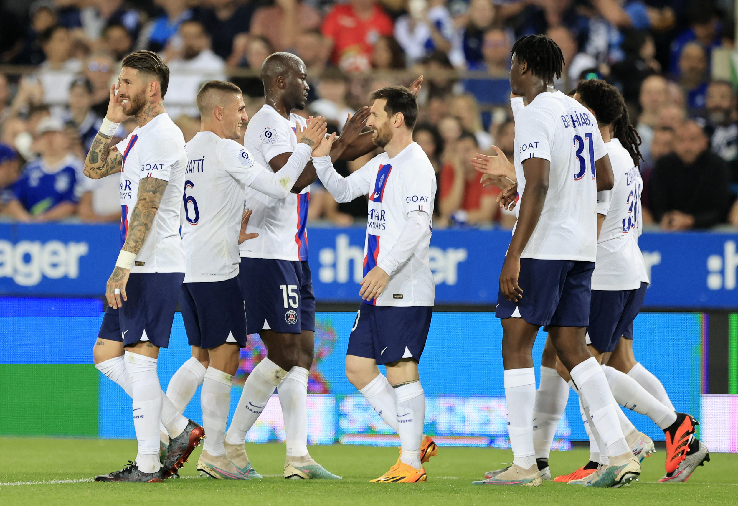 Soccer Football - Ligue 1 - RC Strasbourg v Paris St Germain - Stade de la Meinau, Strasbourg, France - May 27, 2023  Paris St Germain's Lionel Messi celebrates scoring their first goal with Danilo Pereira, Marco Verratti and Sergio Ramos REUTERS