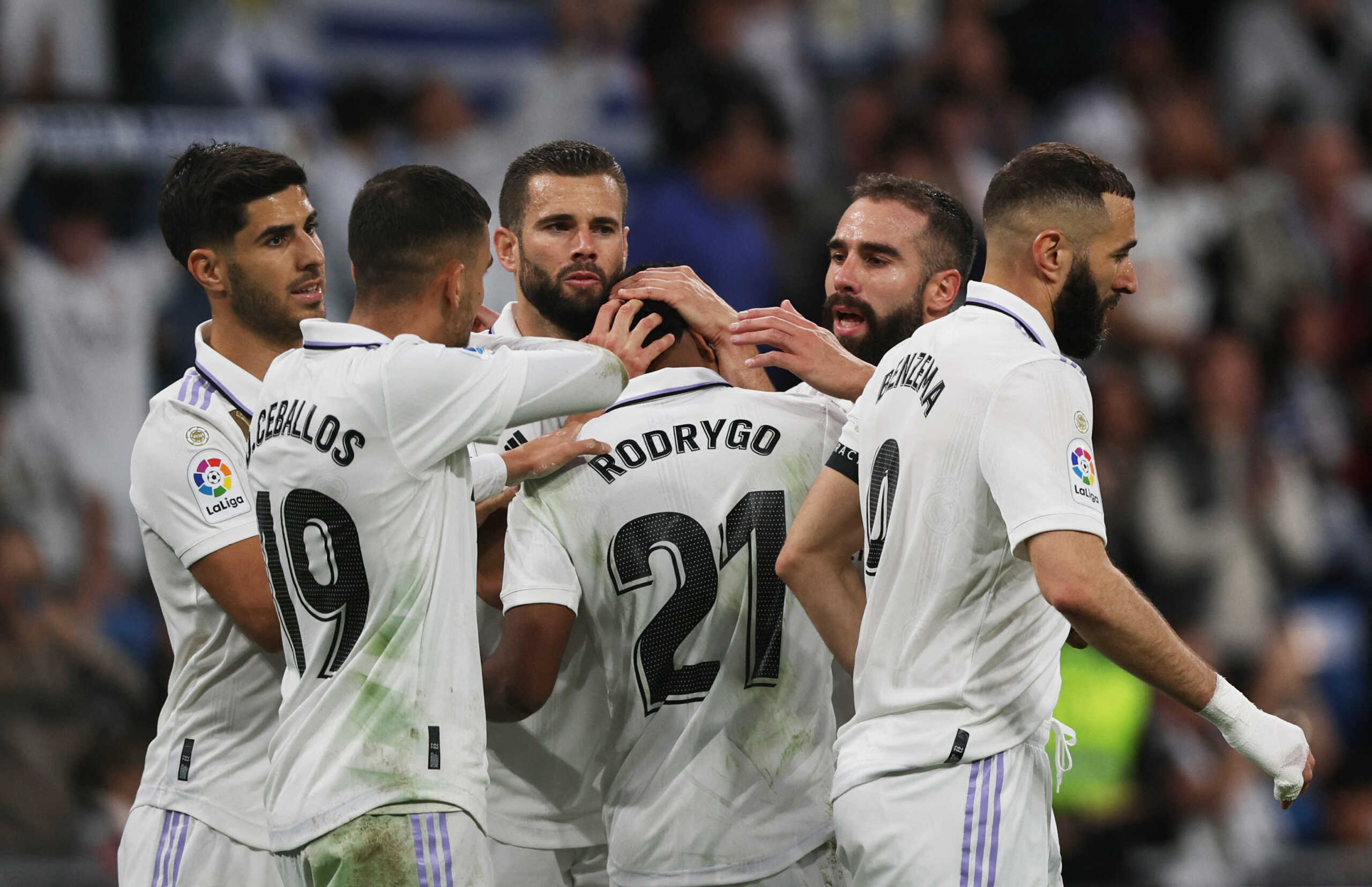 Soccer Football - LaLiga - Real Madrid v Rayo Vallecano - Santiago Bernabeu, Madrid, Spain - May 24, 2023 Real Madrid's Rodrygo celebrates scoring their second goal with teammates REUTERS