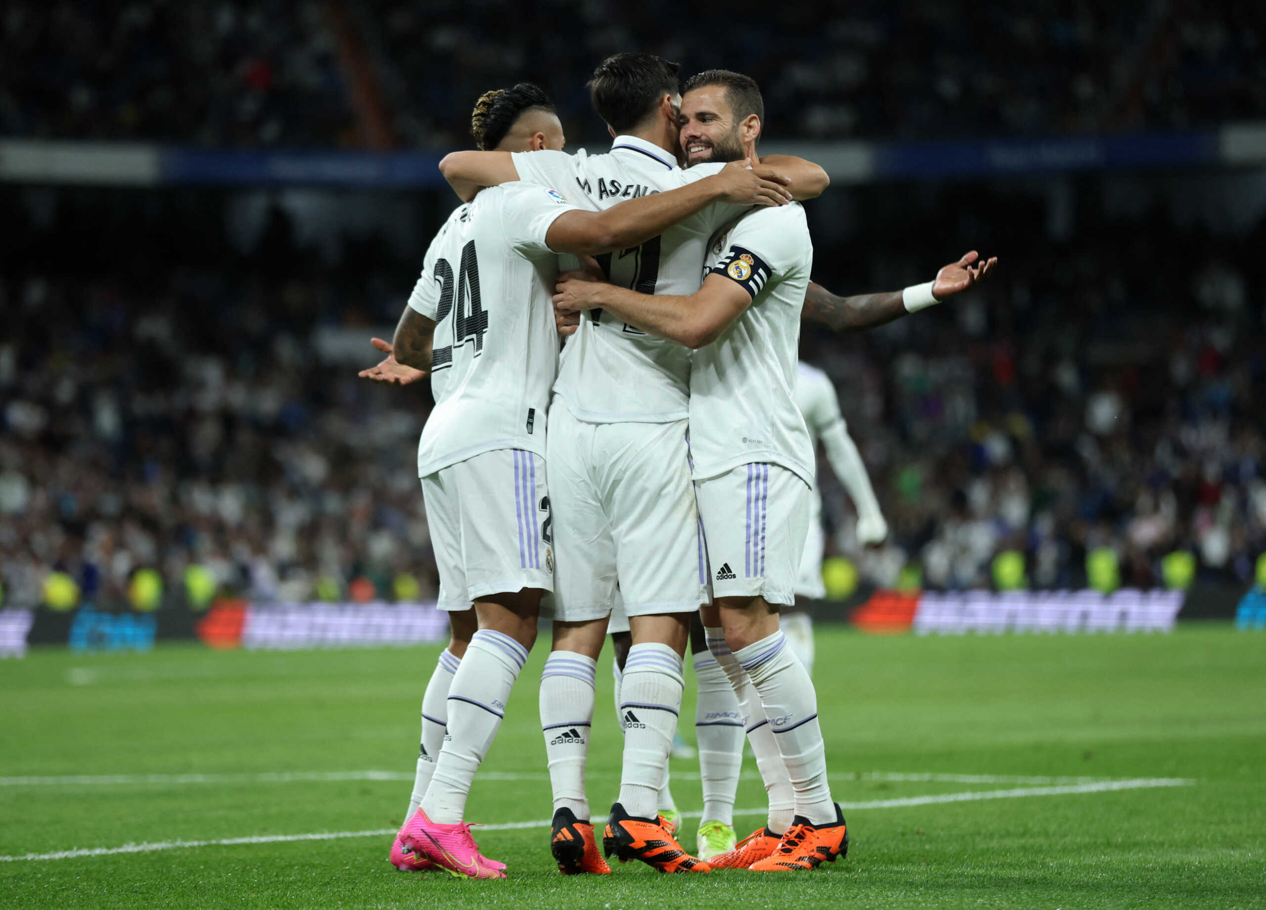 Soccer Football - LaLiga - Real Madrid v Getafe - Santiago Bernabeu, Madrid, Spain - May 13, 2023 Real Madrid's Marco Asensio celebrates scoring their first goal with Mariano and Nacho REUTERS