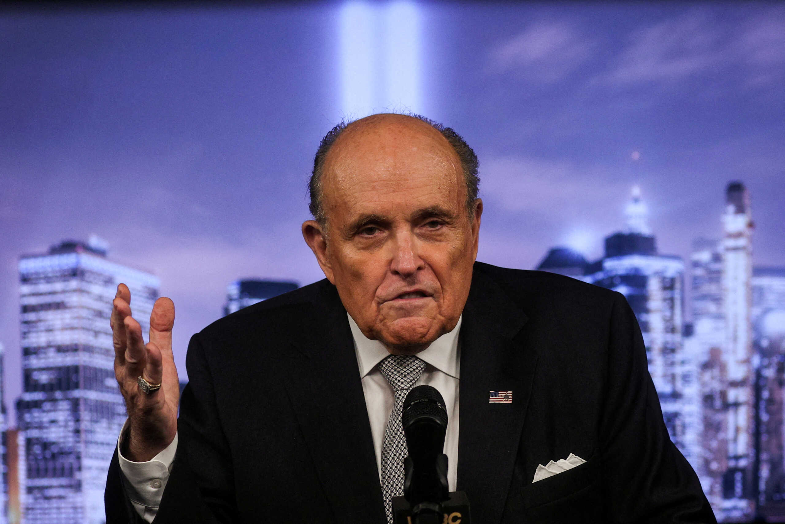 FILE PHOTO: Former New York City Mayor Rudy Giuliani delivers remarks on the September 11 attacks during a news conference in New York, U.S., September 9, 2022. REUTERS