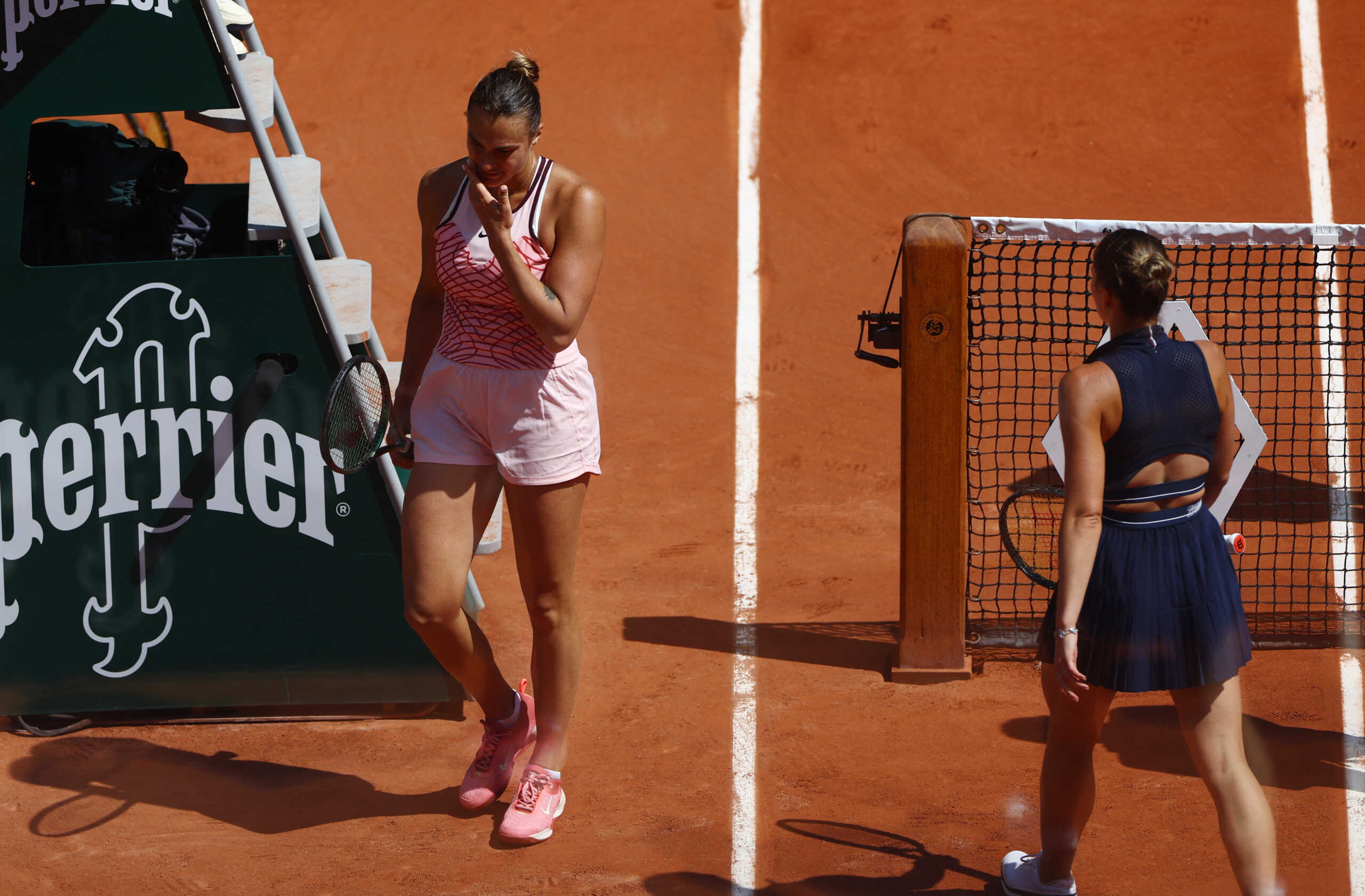 Tennis - French Open - Roland Garros, Paris, France - May 28, 2023 Belarus' Aryna Sabalenka and Ukraine's Marta Kostyuk during a break in play on their first round match REUTERS