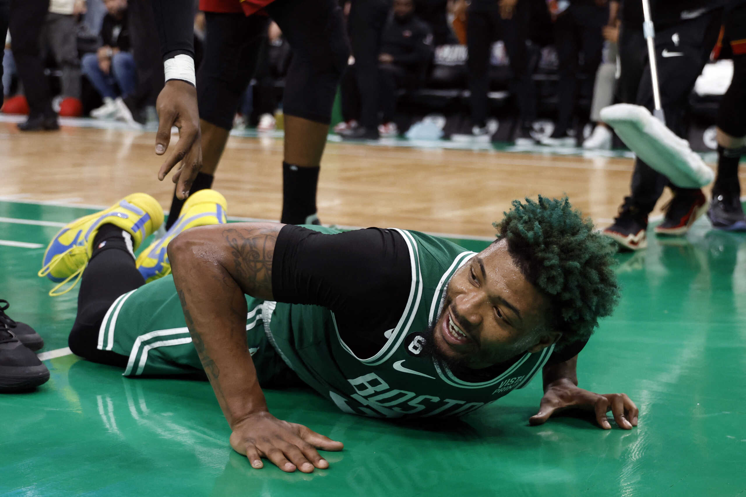 May 25, 2023; Boston, Massachusetts, USA; Boston Celtics guard Marcus Smart (36) reacts after a collision during the third quarter against the Miami Heat in game five of the Eastern Conference Finals for the 2023 NBA playoffs at TD Garden. Mandatory Credit: Winslow Townson-USA TODAY Sports