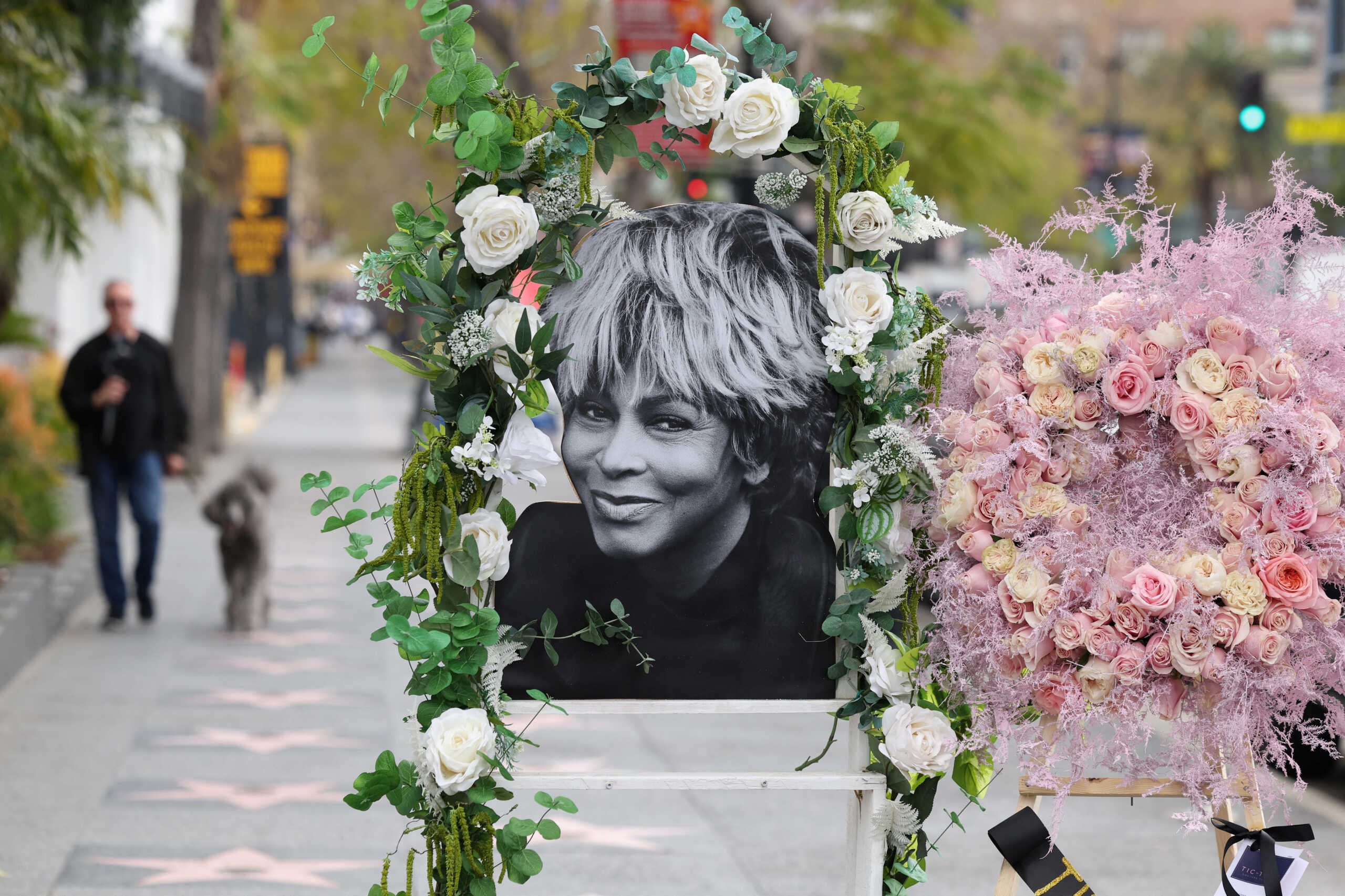 A photograph from late singer Tina Turner adorned with flowers is pictured on the Hollywood Walk of Fame in Los Angeles, California, U.S., May 24, 2023. REUTERS