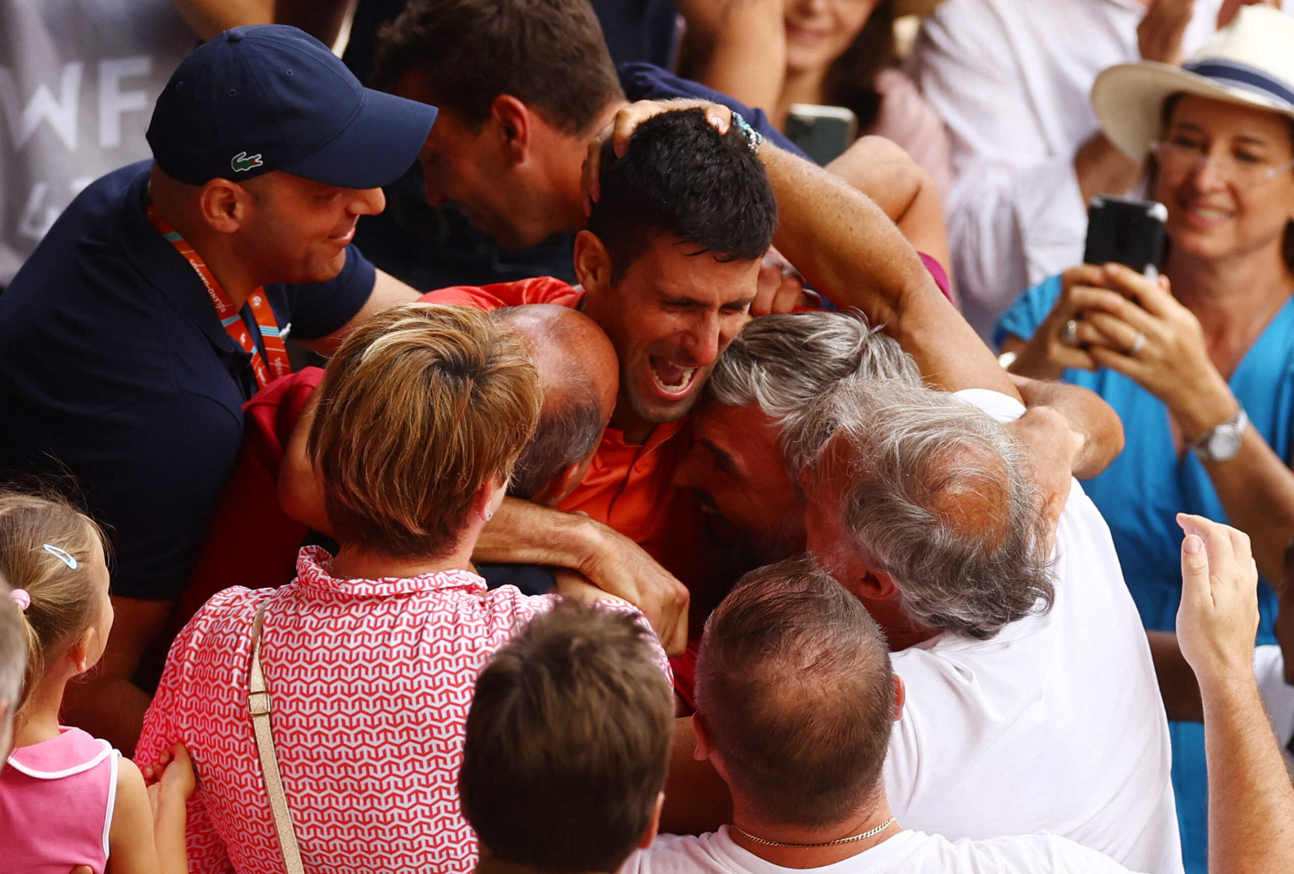 Tennis - French Open - Roland Garros, Paris, France - June 11, 2023 Serbia's Novak Djokovic celebrates with his team after winning the final against Norway's Casper Ruud REUTERS