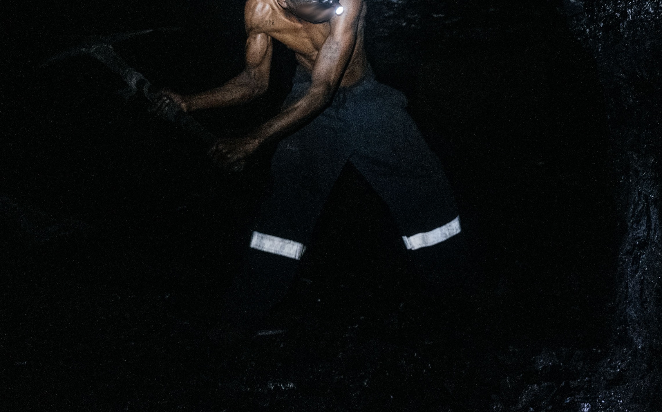 13 August 2020. An artisanal miner works at a coal-face in Mastepiseni informal coal mine outside Ermelo, South Africa. Photograph: James Puttick.