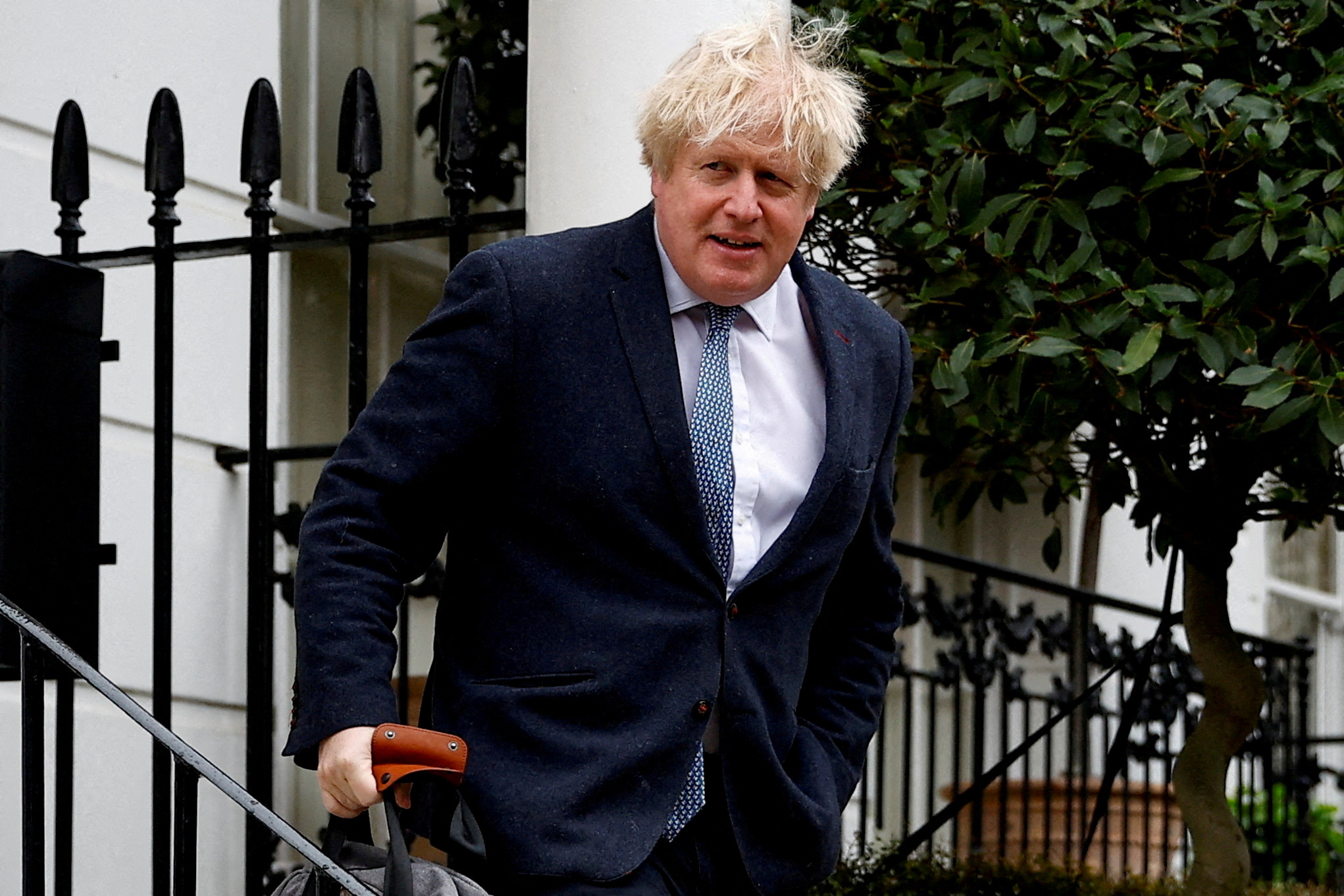 FILE PHOTO: Former British Prime Minister Boris Johnson leaves his home, in London, Britain March 21, 2023. REUTERS