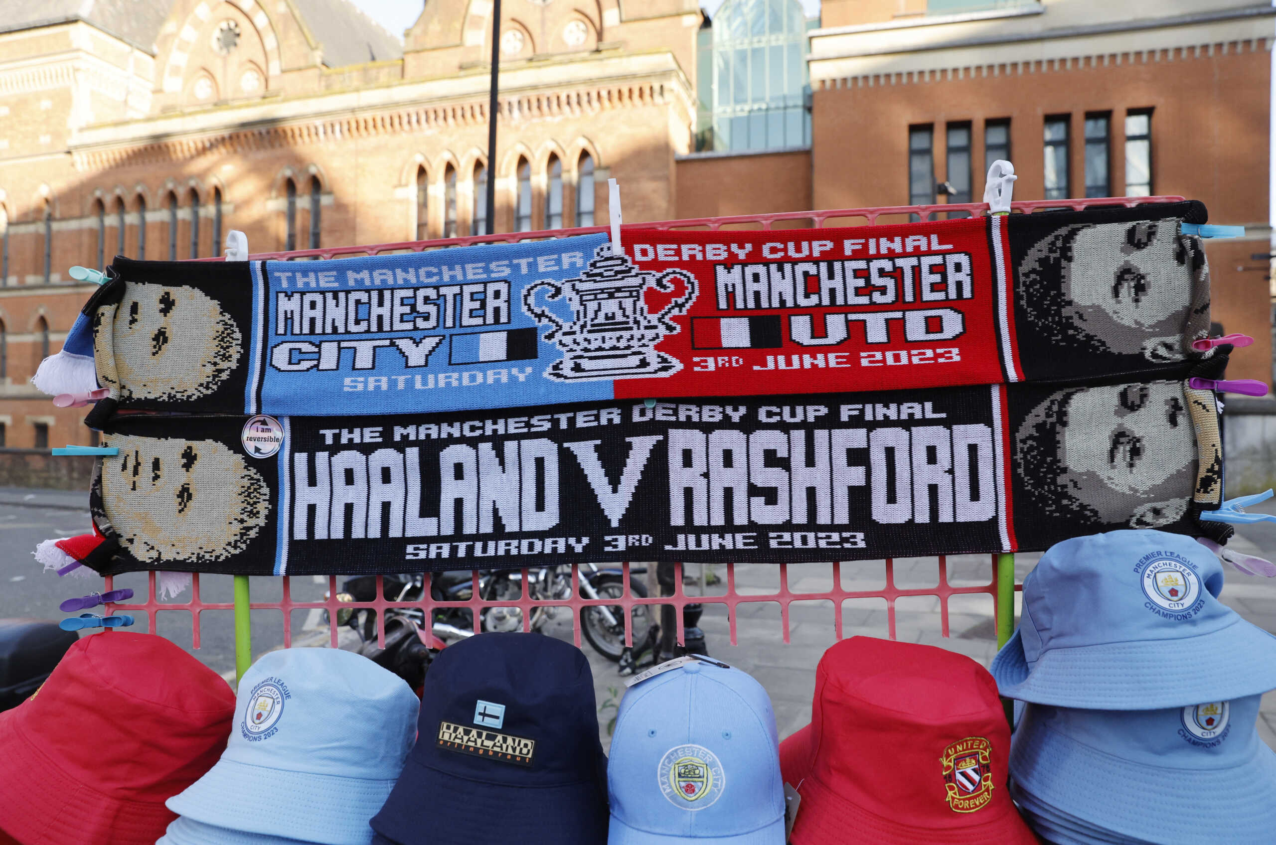 Soccer Football - FA Cup Final - Manchester City v Manchester United - Manchester, Britain - June 3, 2023 General view of merchandise for sale at Manchester train station Action Images via Reuters