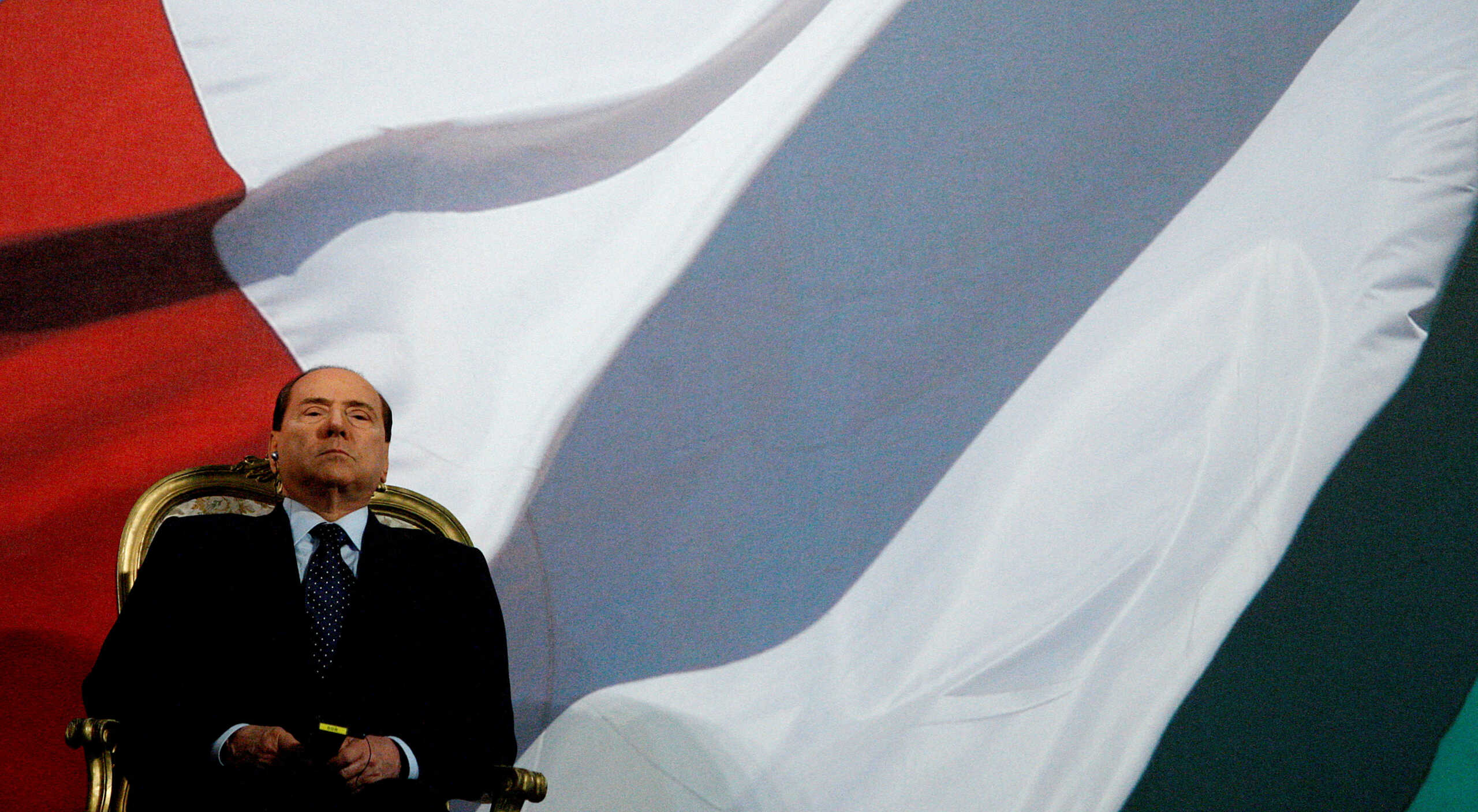 FILE PHOTO: Italy's Prime Minister Silvio Berlusconi attends a carousel performed by Italian Carabinieri Cavalry and Barbary Cavalry in Rome, Italy, August 30, 2010.  REUTERS
