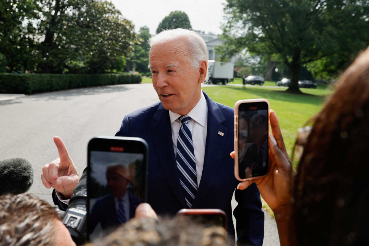 U.S. President Joe Biden speaks to members of the media as he departs for travel to Chicago from the White House in Washington, U.S. June 28, 2023. REUTERS
