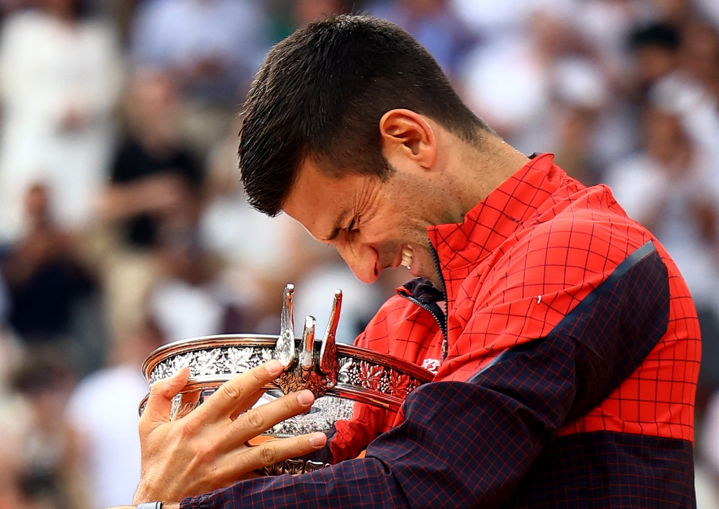 Tennis - French Open - Roland Garros, Paris, France - June 11, 2023 Serbia's Novak Djokovic celebrates with the trophy after winning the French Open REUTERS