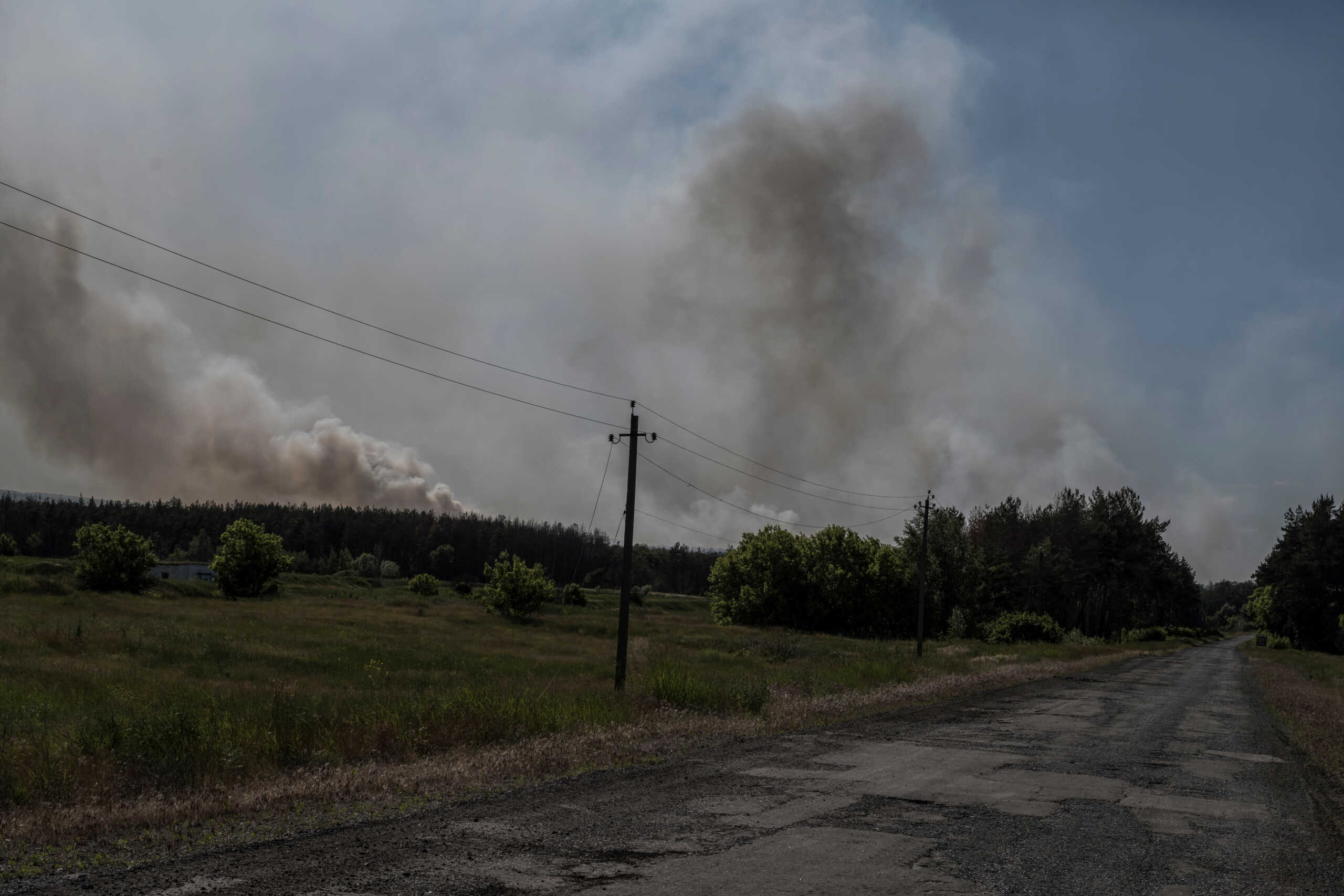 Smoke rises over an area of the Ukraine-Russia border, amid Russia's attack on Ukraine, in Kharkiv region, Ukraine, June 4, 2023. REUTERS