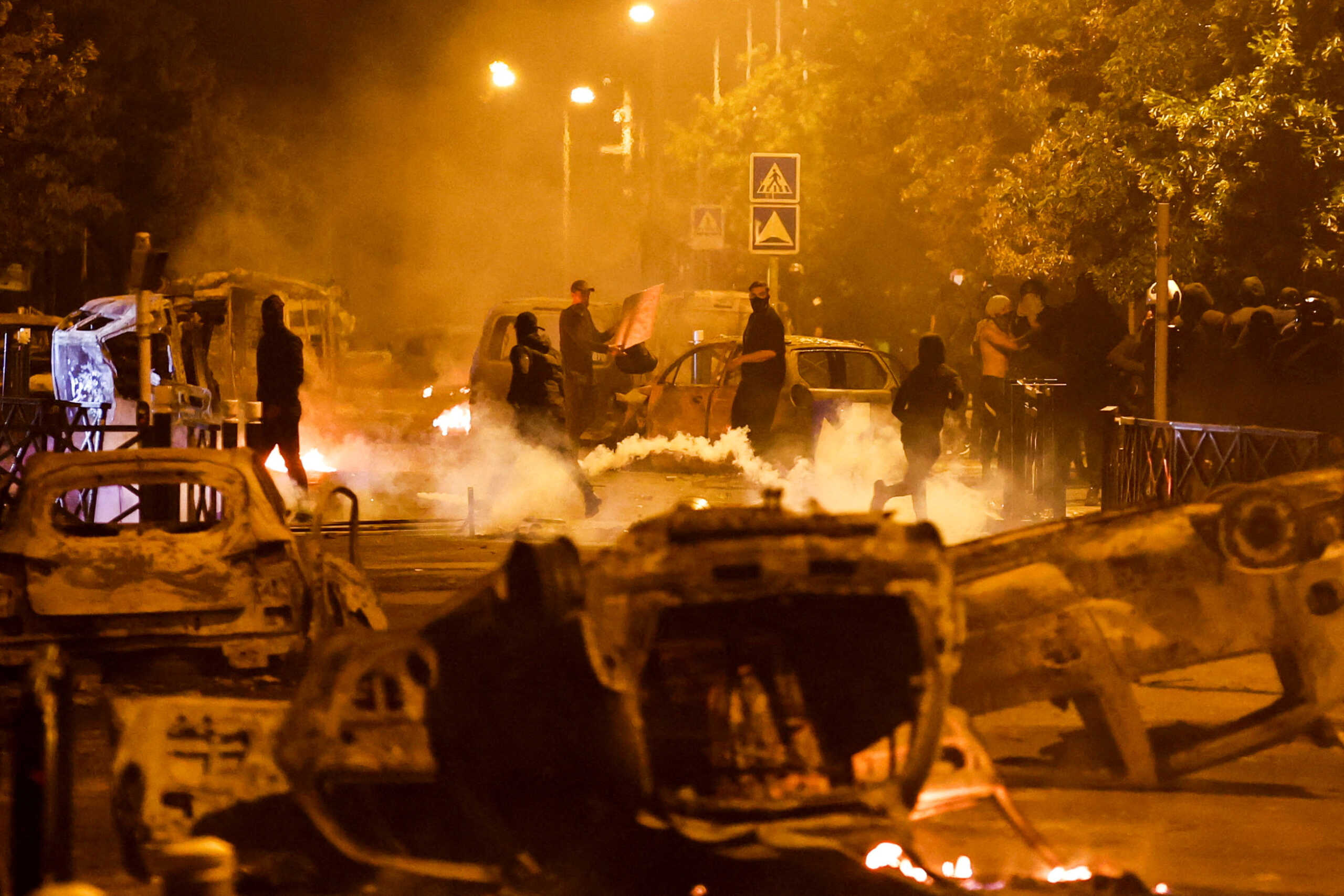 Protesters clash with police, following the death of Nahel, a 17-year-old teenager killed by a French police officer during a traffic stop, in Nanterre, Paris suburb, France, June 30, 2023. REUTERS