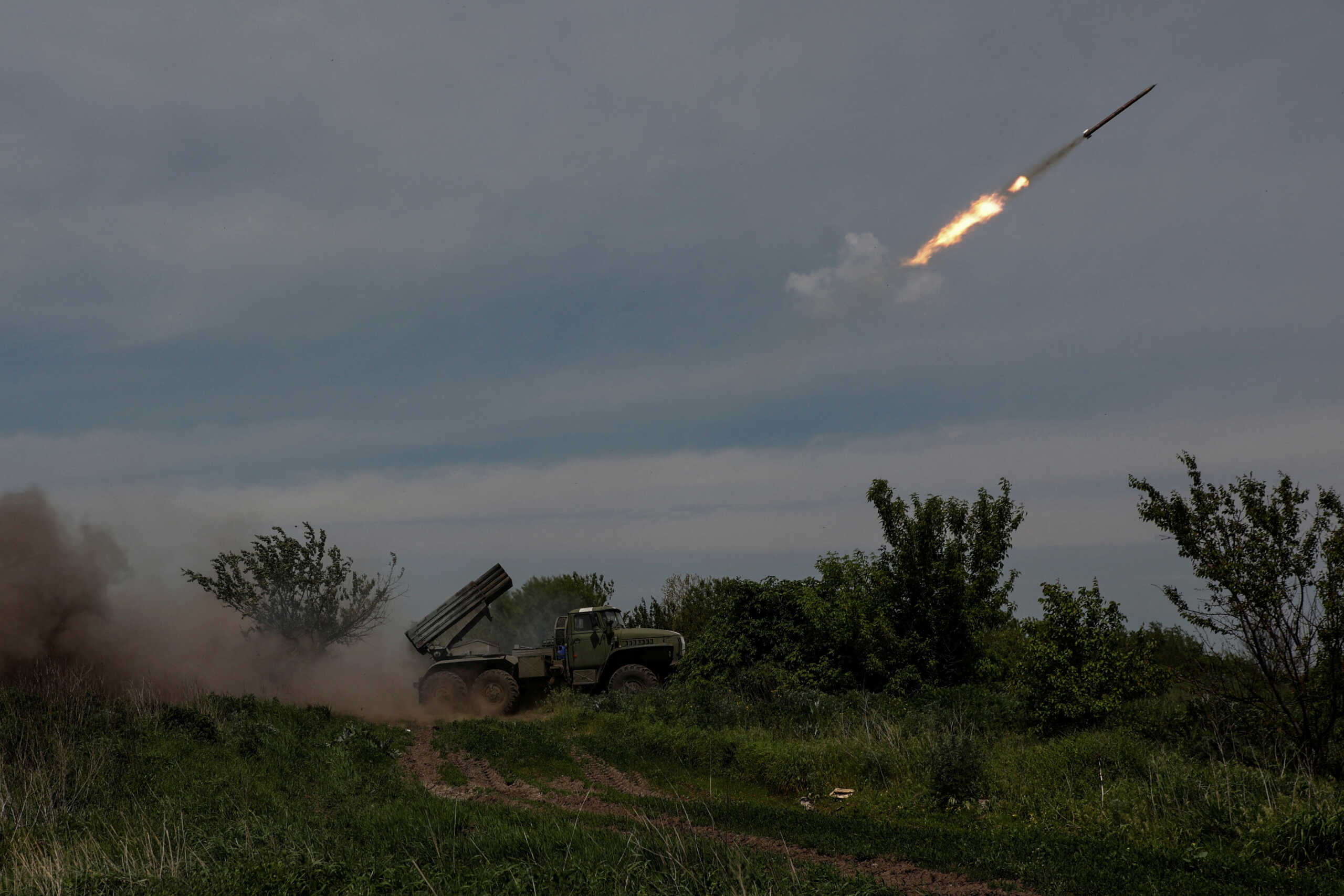 Ukrainian servicemen fire a BM-21 Grad multiple launch rocket system towards Russian troops, amid Russia's attack on Ukraine, near the frontline town of Bakhmut, Ukraine May 19, 2023. Radio Free Europe