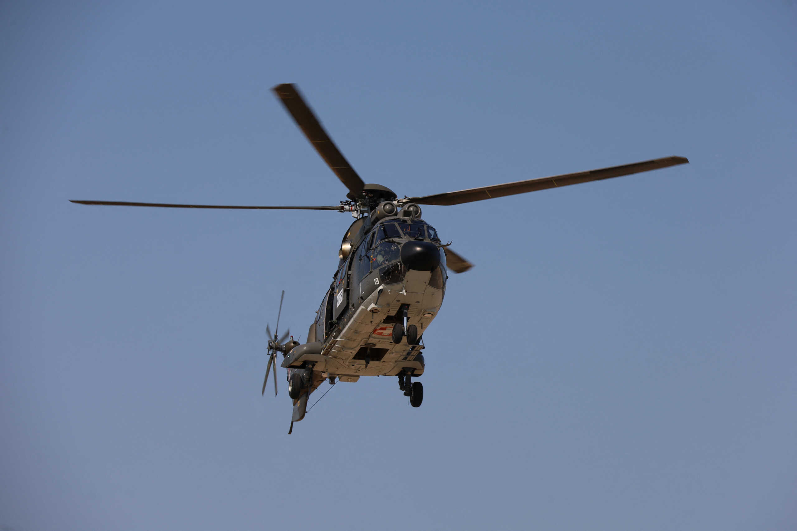 A helicopter from the Swiss army which is part of the NATO mission in Kosovo gets ready to land at NATO?s headquarters in Pristina, Kosovo June 20, 2023. REUTERS