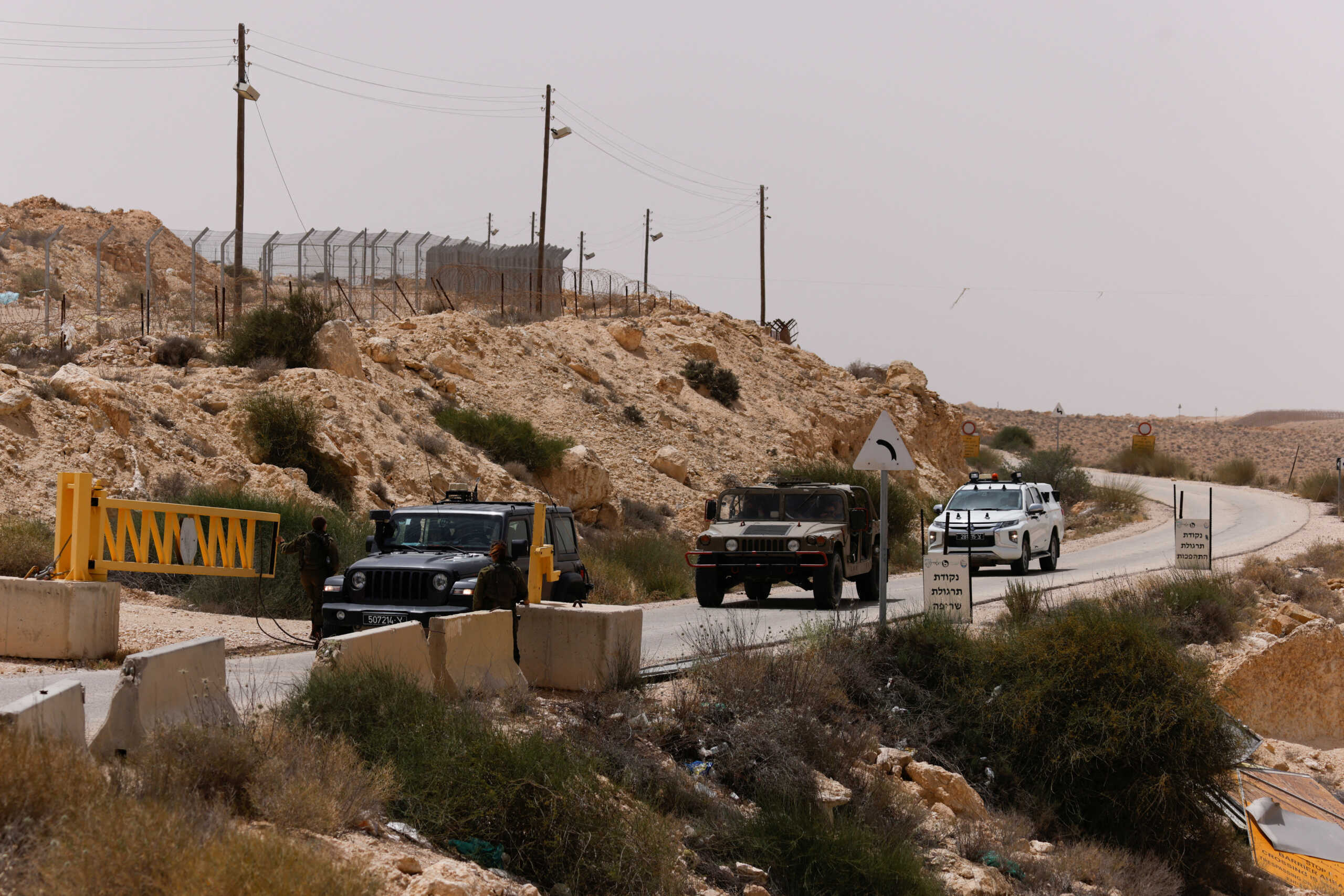 Vehicles approach the gate near the site of a reported security incident near Israel's southern border with Egypt, Israel June 3, 2023. REUTERS