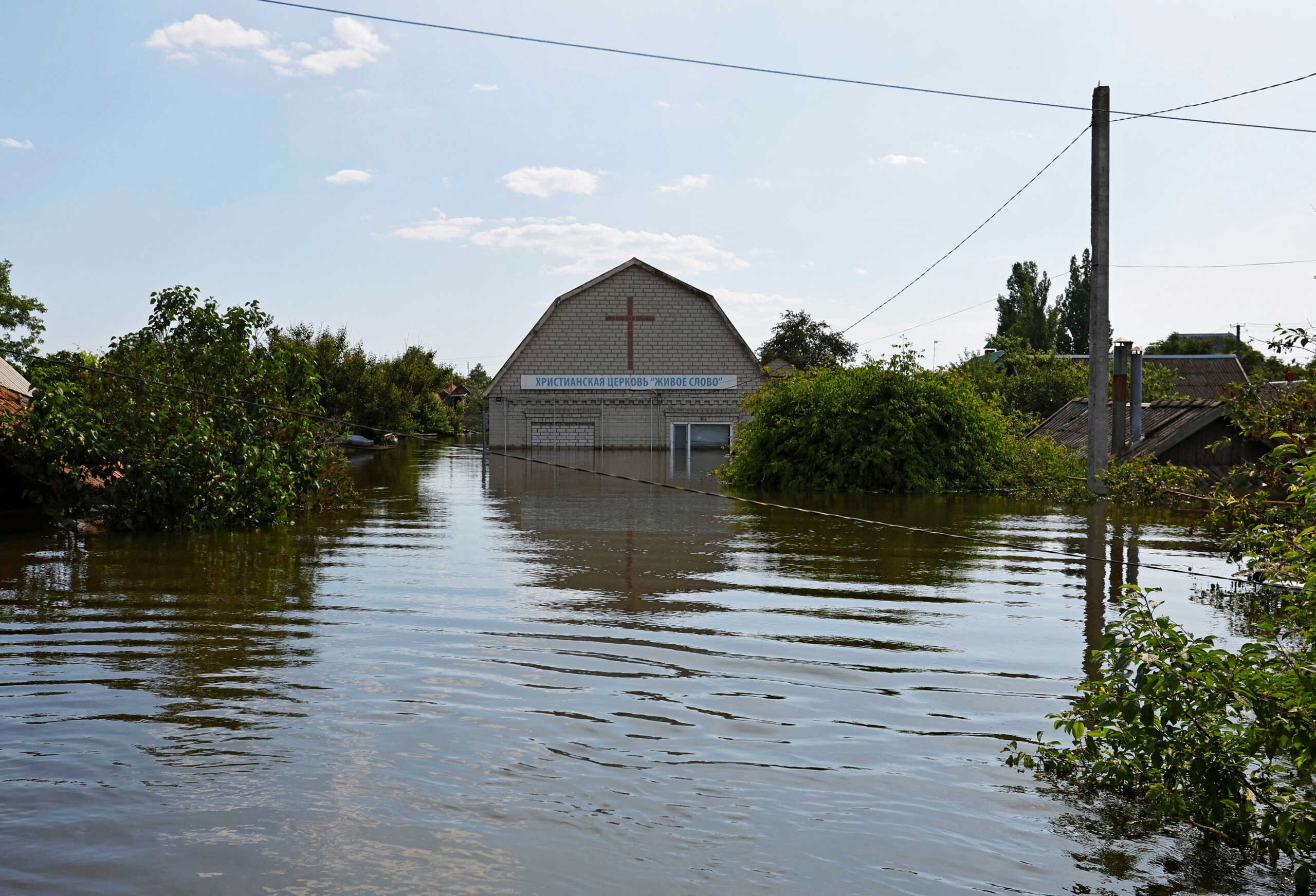A view shows a flooded residential area following the collapse of the Nova Kakhovka dam in the course of Russia-Ukraine conflict, in the town of Hola Prystan in the Kherson region, Russian-controlled Ukraine, June 8, 2023. REUTERS