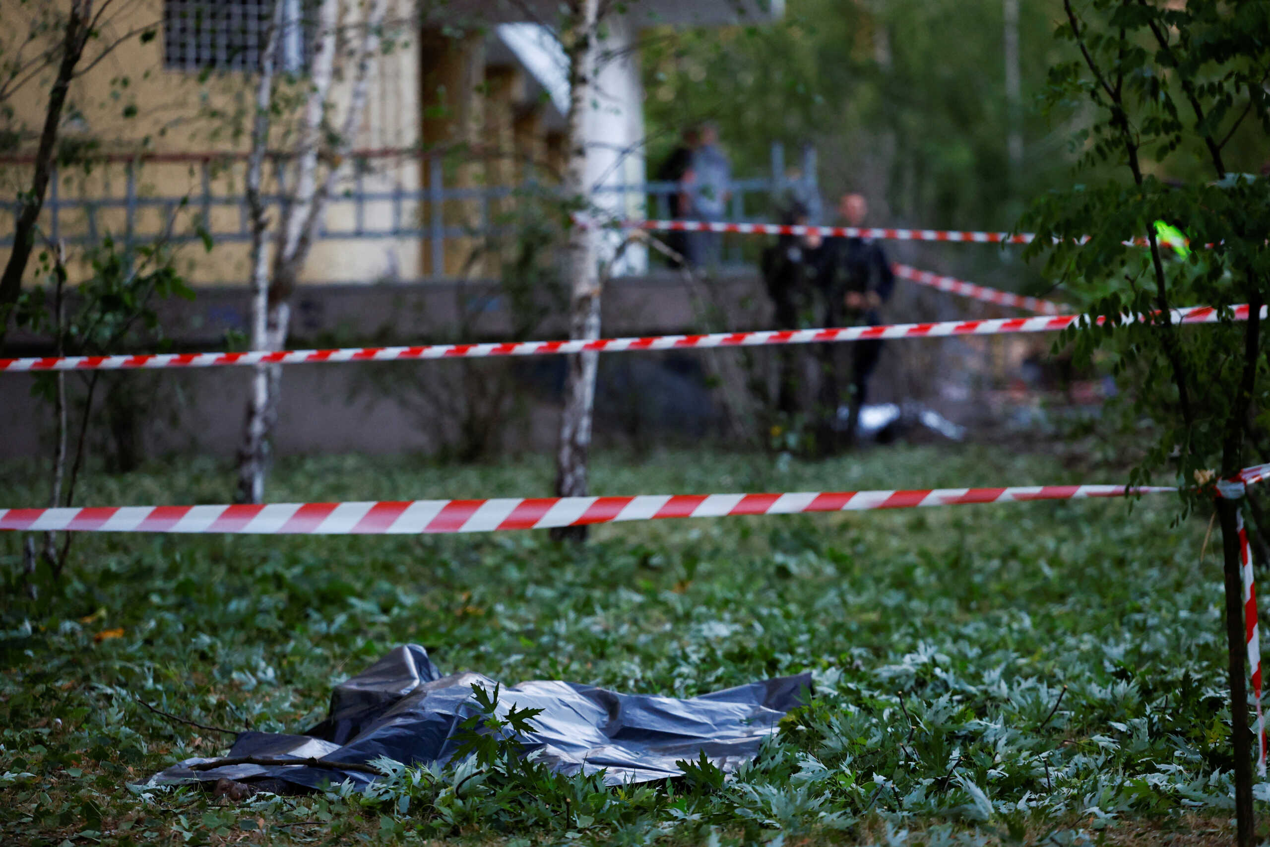 The body of a person killed in a Russian missile strike is seen at the compound of a municipal clinic, amid Russia’s attack on Ukraine, in Kyiv, Ukraine June 1, 2023. REUTERS