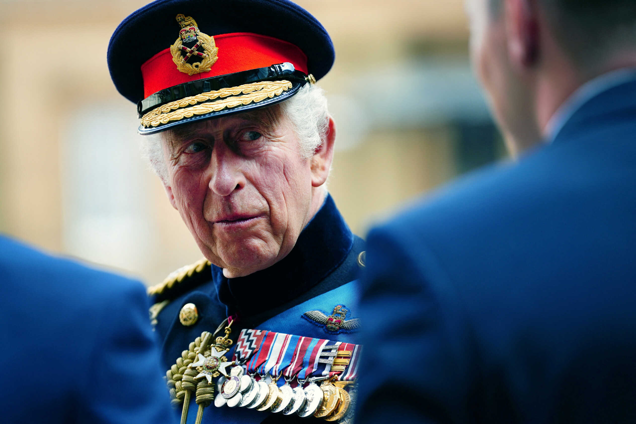 Britain's King Charles, speaks with guests as he and Anne, the Princess Royal (not pictured) present the new Sovereign's Standard to the Blues and Royals (Royal Horse Guards and 1st Dragoons) during a ceremony at Buckingham Palace, London, Britain. Picture date: Thursday June 15, 2023.   Victoria Jones