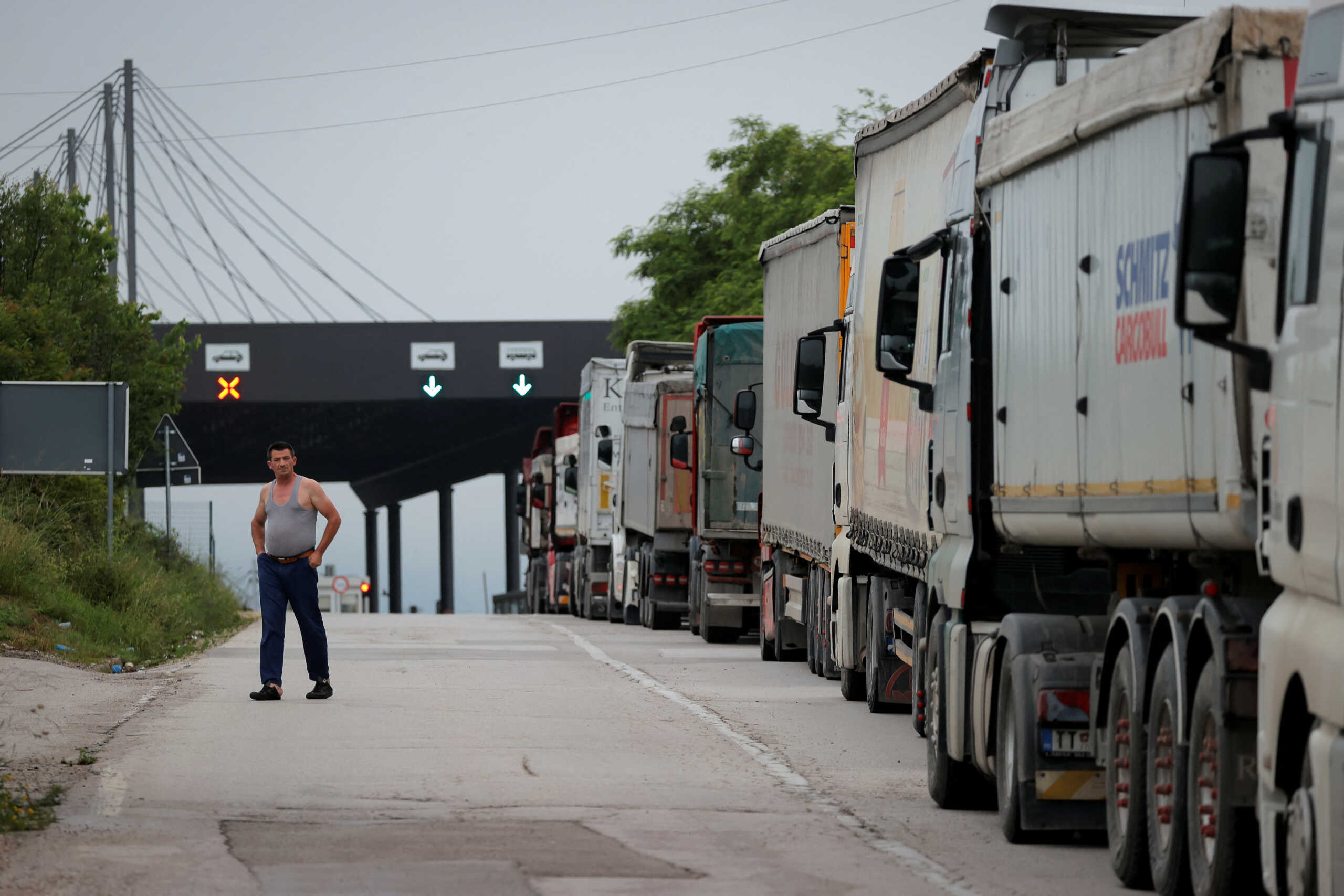 Trucks with goods queue at the Kosovo-Serbia border crossing in Merdare, Kosovo, June 15, 2023. REUTERS
