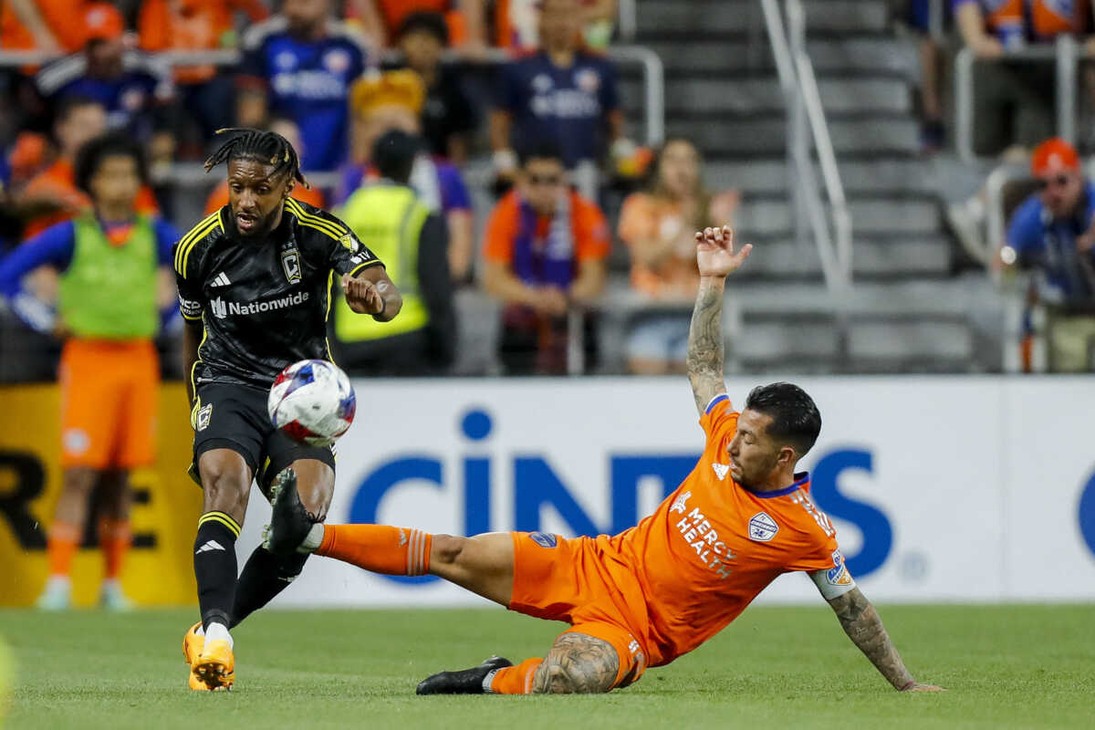May 20, 2023; Cincinnati, Ohio, USA; Columbus Crew defender Steven Moreira (31) battles for the ball against FC Cincinnati midfielder Luciano Acosta (10) in the second half at TQL Stadium. Mandatory Credit: Katie Stratman-USA TODAY Sports