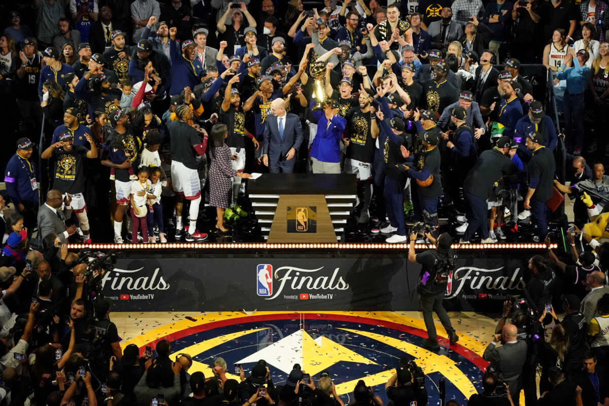 Jun 12, 2023; Denver, Colorado, USA; The Denver Nuggets celebrate after winning the 2023 NBA Finals against the Miami Heat at Ball Arena. Mandatory Credit: Kyle Terada-USA TODAY Sports