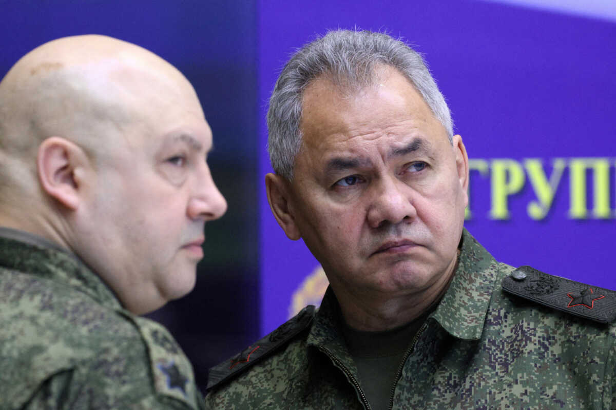 FILE PHOTO: Russian Defence Minister Sergei Shoigu and General Sergei Surovikin, commander of Russian forces in Ukraine, visit the Joint Headquarters of the Russian armed forces involved in military operations in Ukraine, in an unknown location in Russia, in this picture released December 17, 2022. Sputnik
