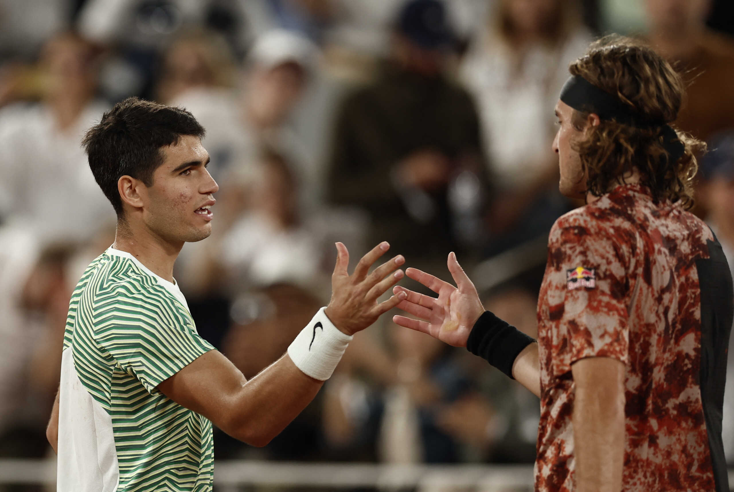 Tennis - French Open - Roland Garros, Paris, France - June 6, 2023 Spain's Carlos Alcaraz shakes hands with Greece's Stefanos Tsitsipas  after winning his quarter final match REUTERS