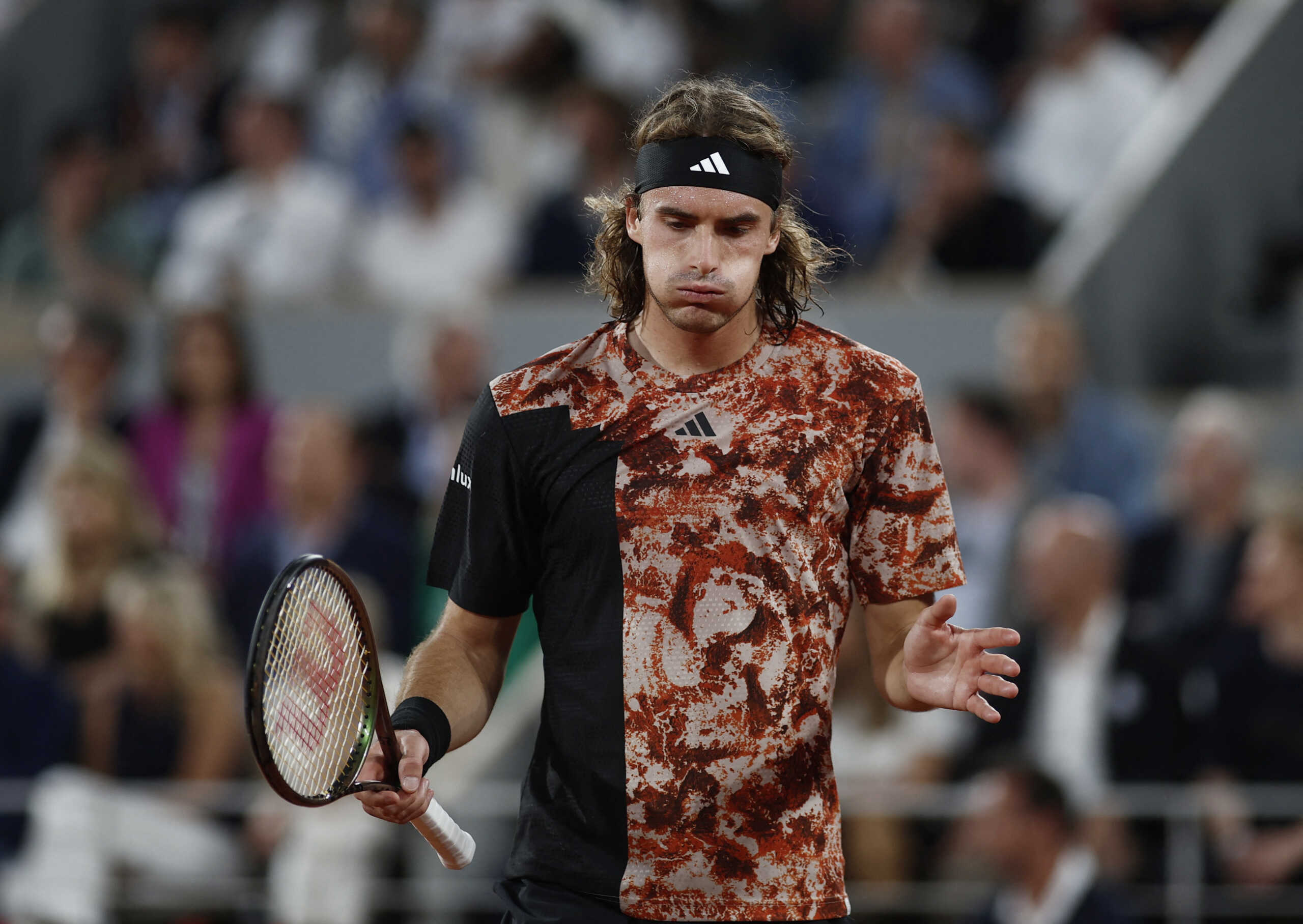Tennis - French Open - Roland Garros, Paris, France - June 6, 2023 Greece's Stefanos Tsitsipas reacts during his quarter final match against Spain's Carlos Alcaraz REUTERS